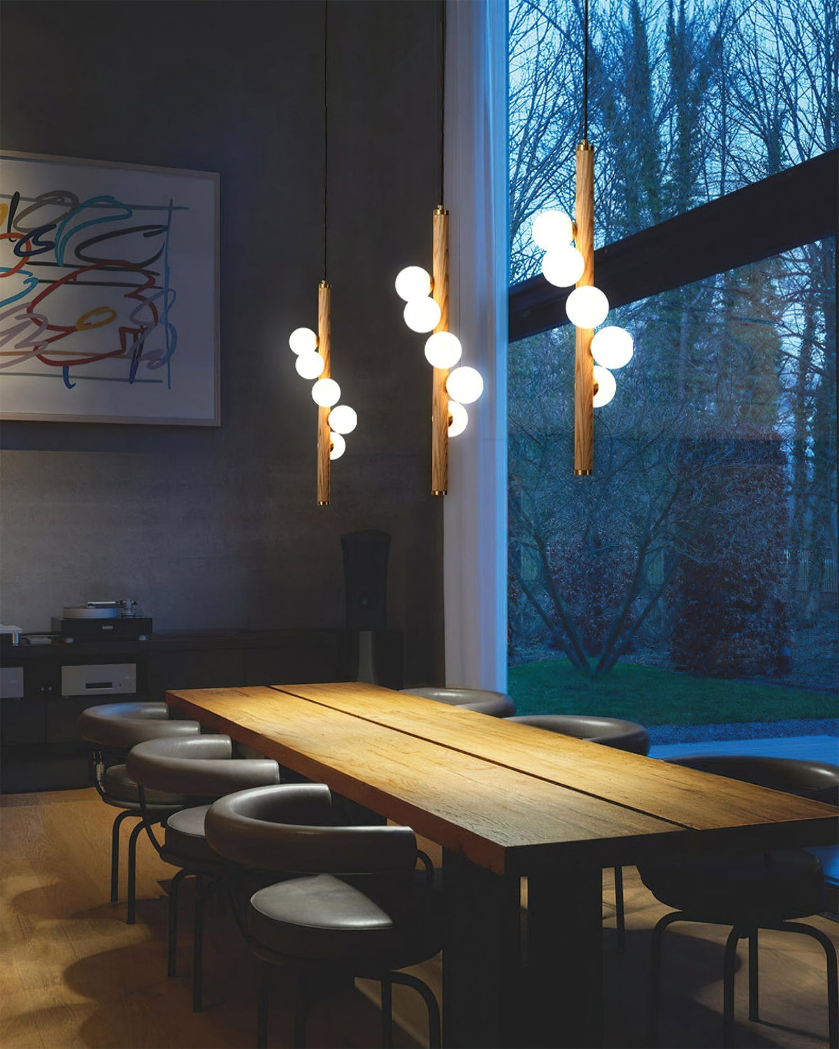 The Miller Pendant Light shown in a modern living room setting.