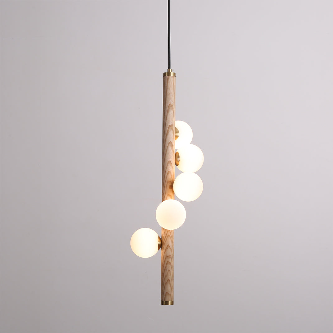 Lifestyle image of the pendant light over a dining table.