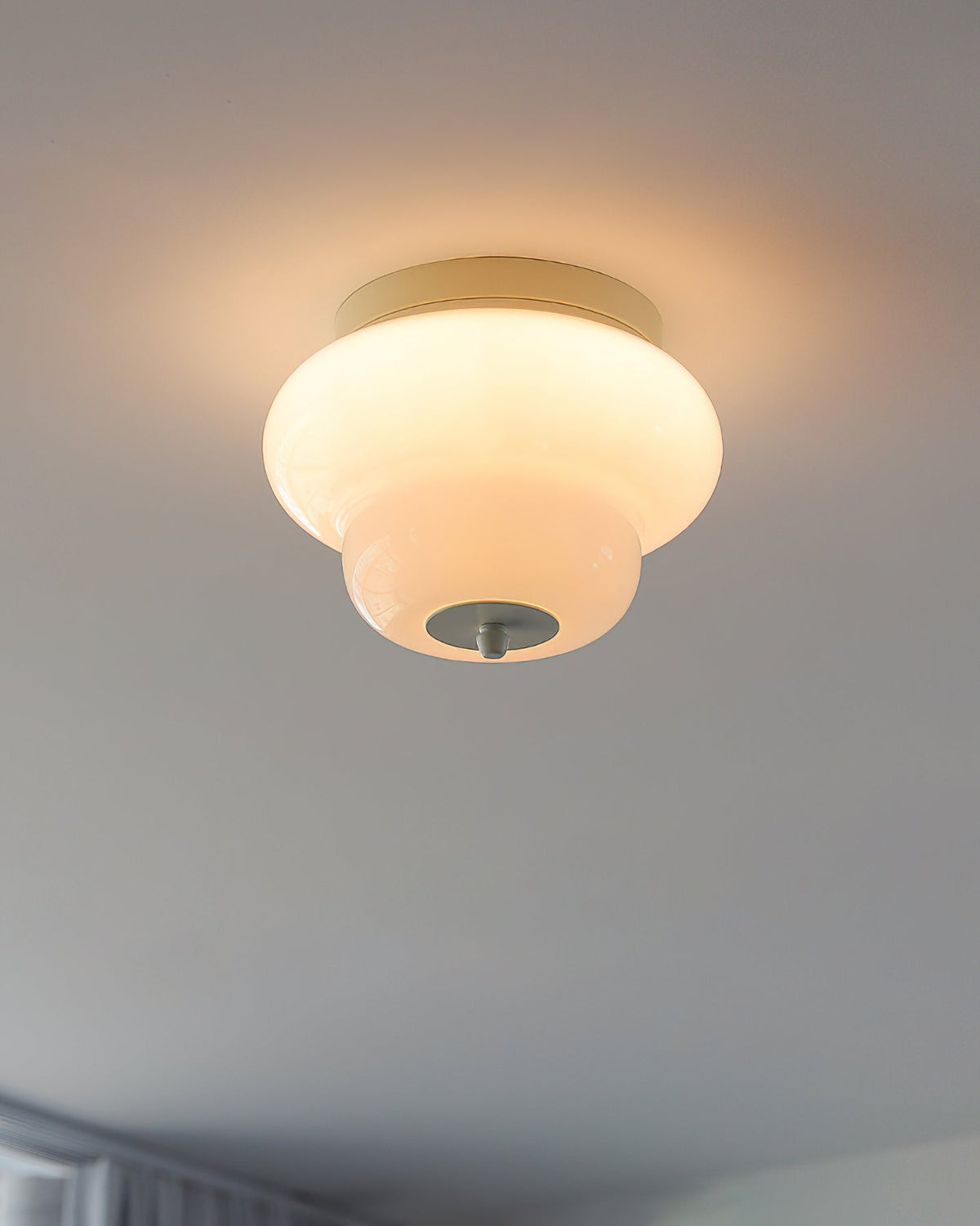 The Milo Ceiling Mount shown in a minimalist living space.