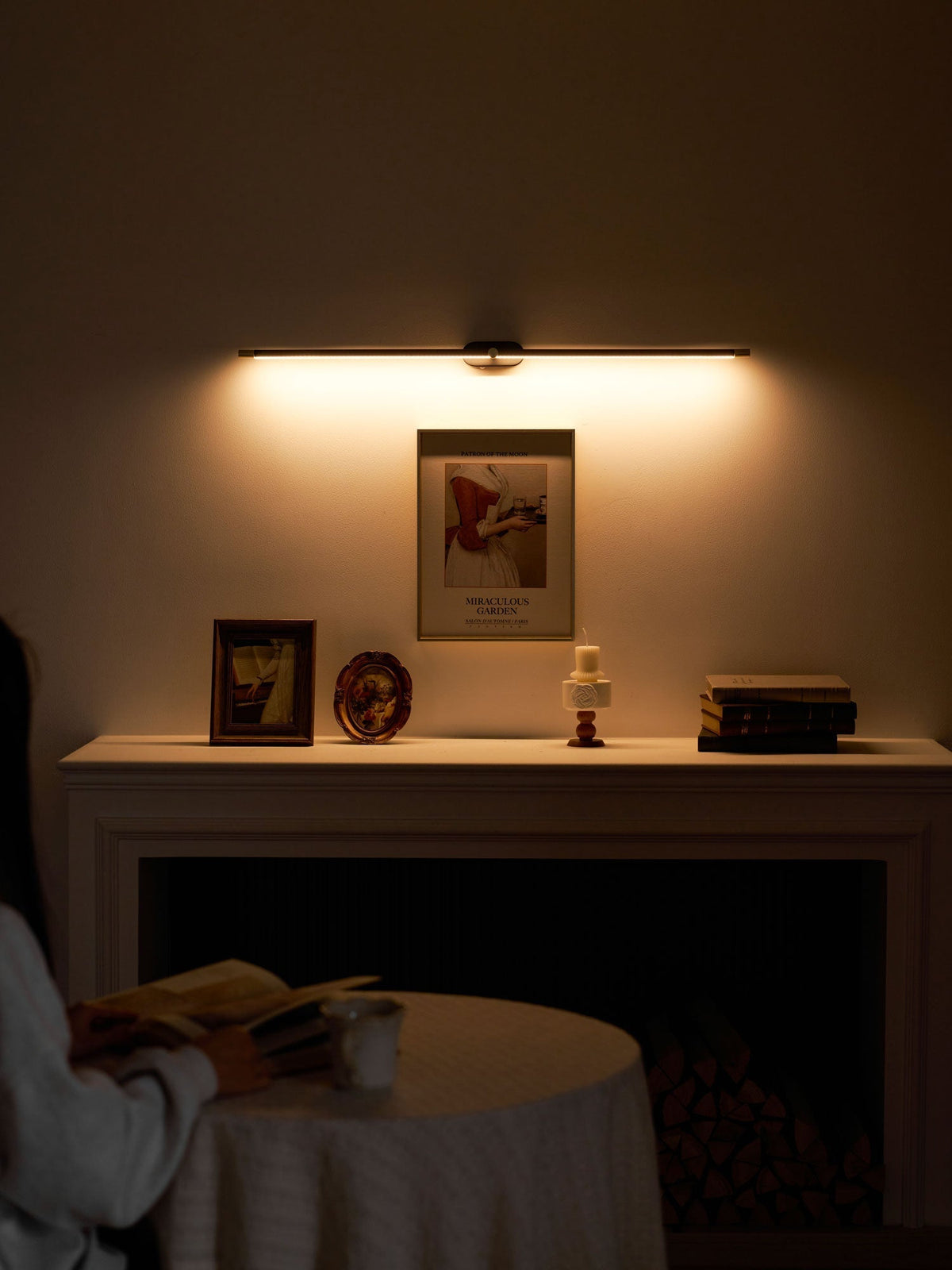 Wall lamp providing accent lighting in a dining area.