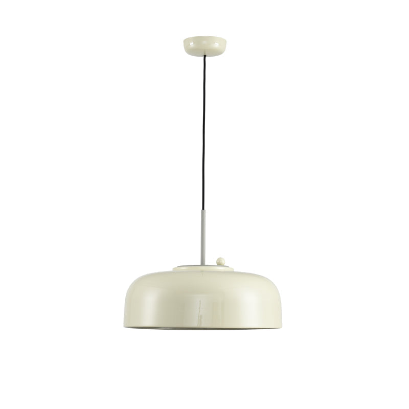 Misha Pendant Light in white over a wooden table.