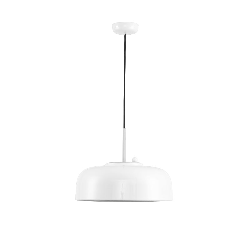 Misha Pendant Light in red in a creative studio space.