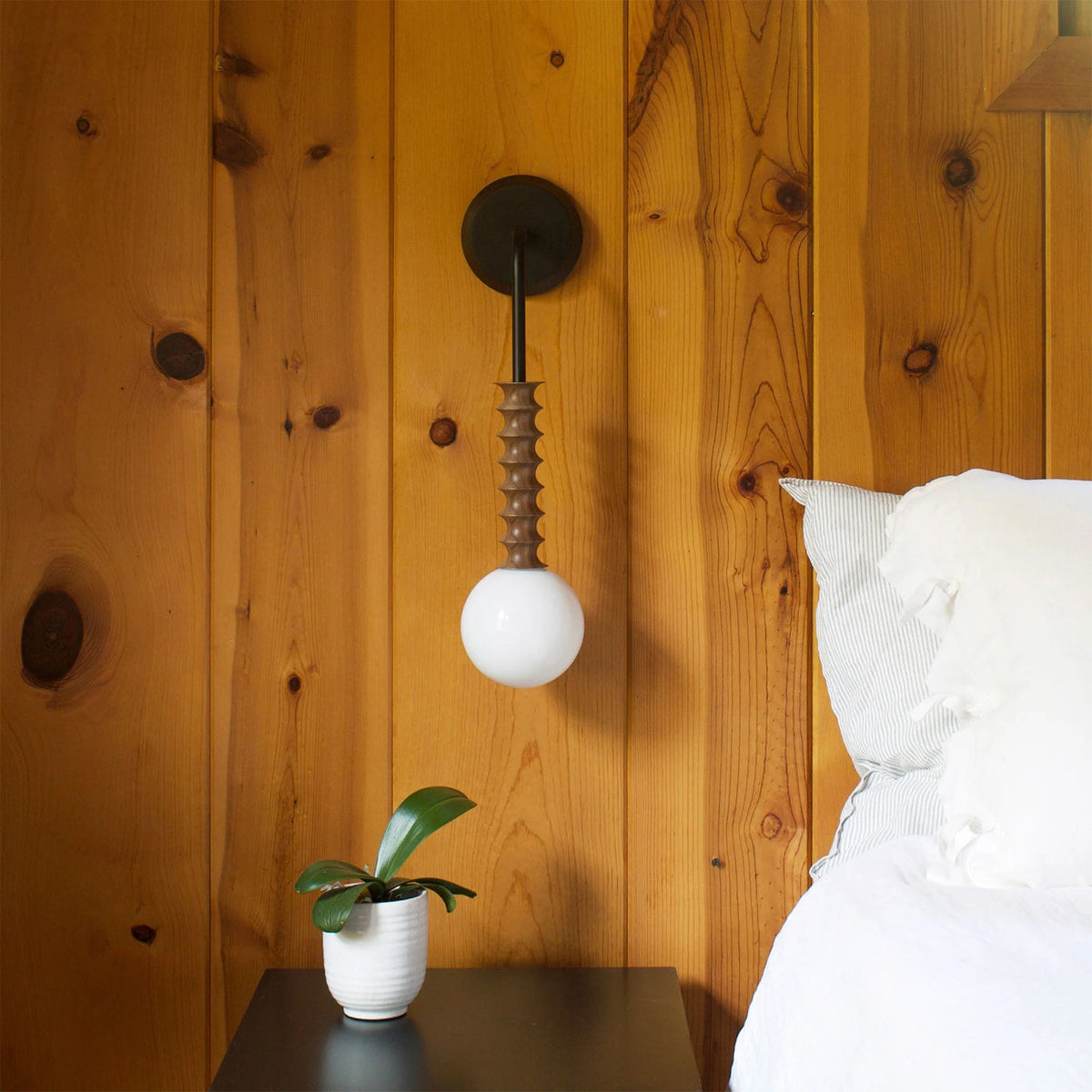 Angled view of the Mobo Wall Lamp showcasing its geometric design.