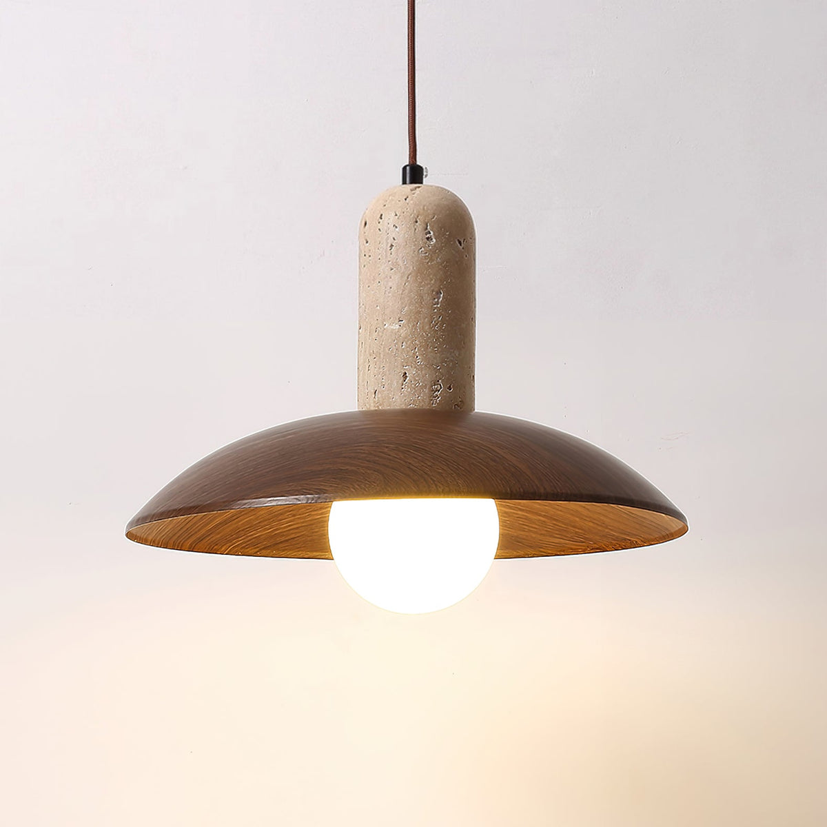 Detail shot of the pendant lamp's interior and bulb fitting.