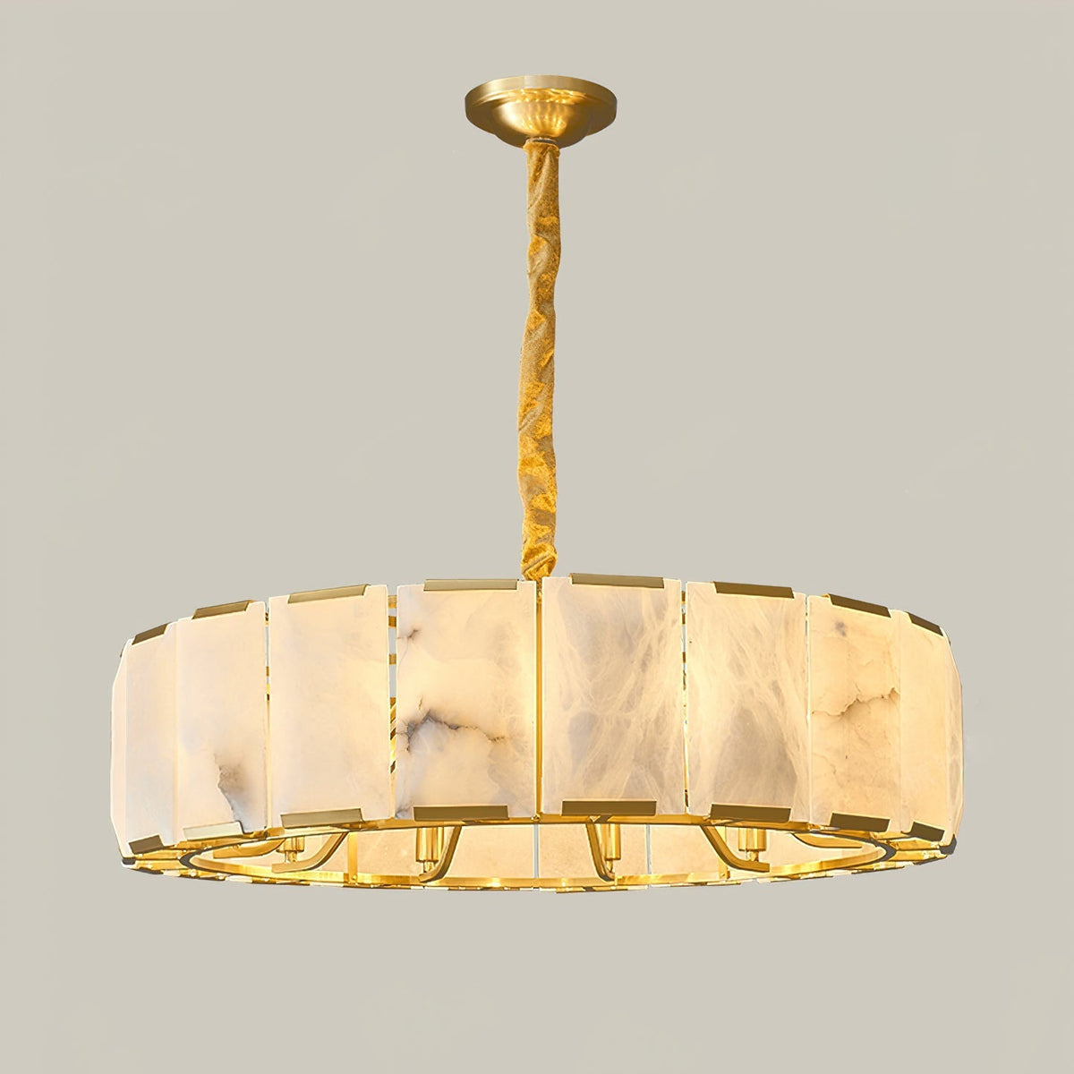 The unique veining of an individual alabaster shade on the chandelier.