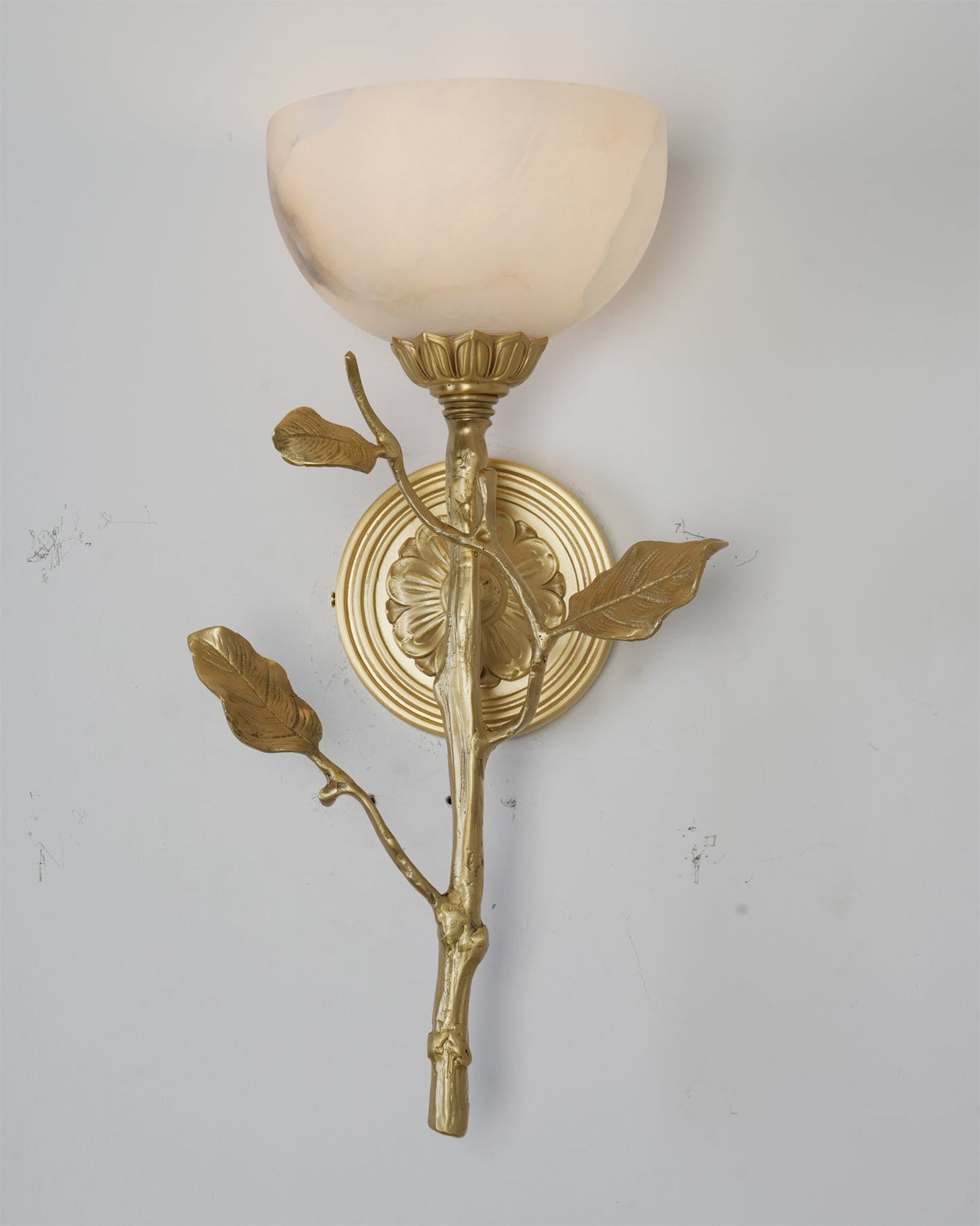 Top-down view of the sconce, revealing the tulip-like shape of the alabaster shade.