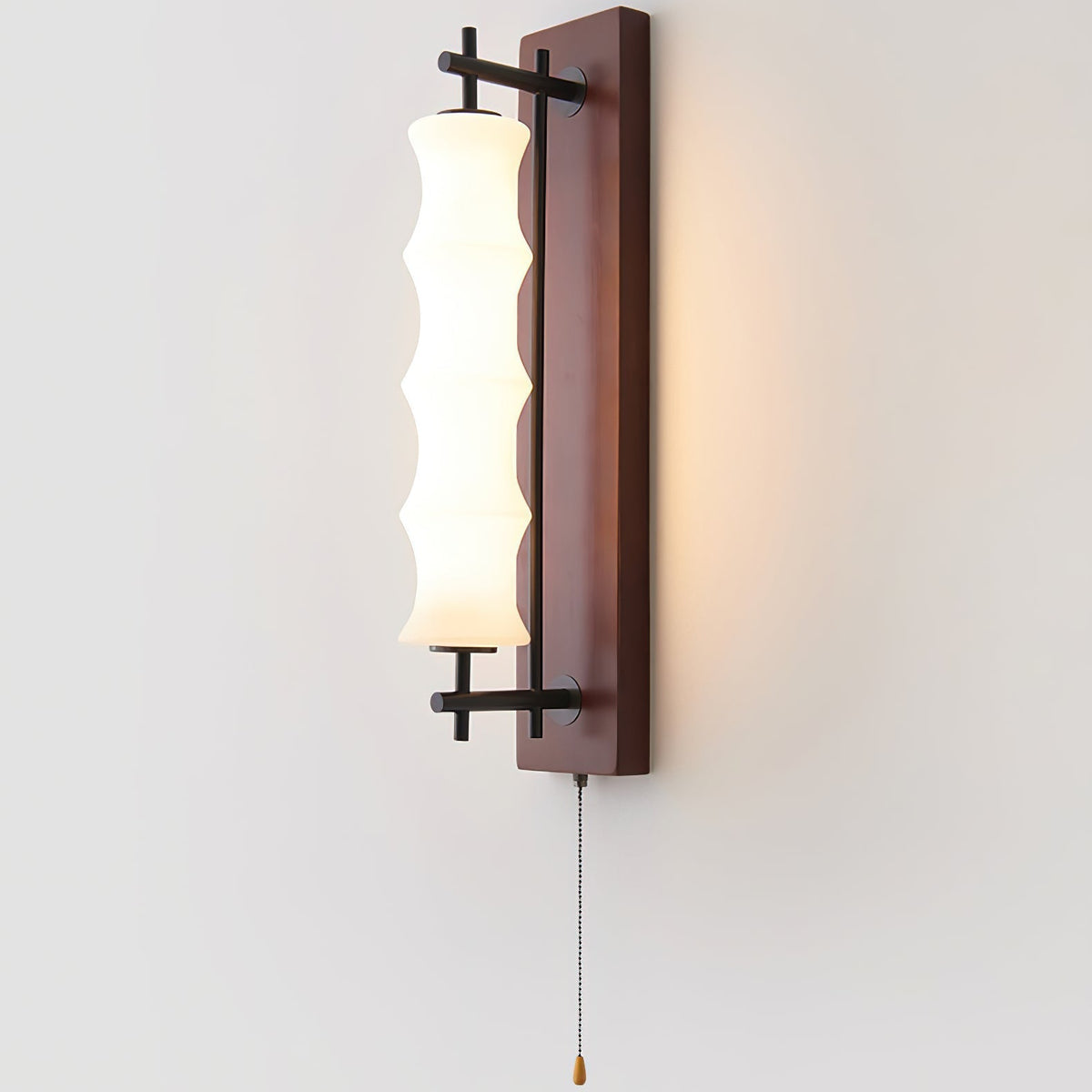 The Nesta wall sconce shown in the wood color finish.