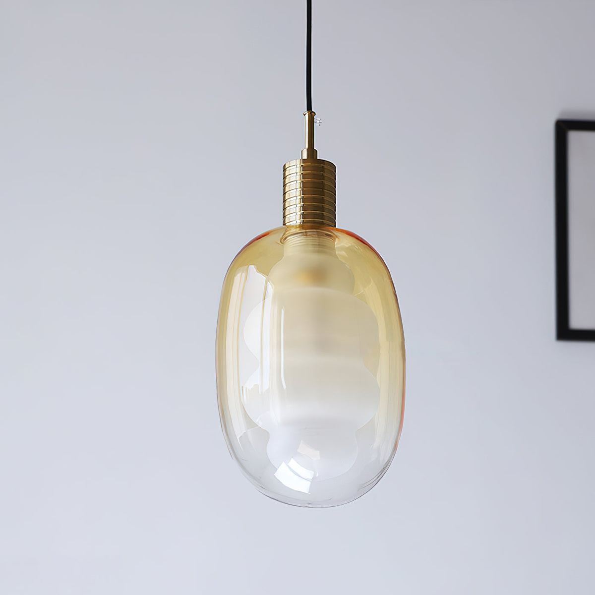 The black metal details on the pendant light fixture.