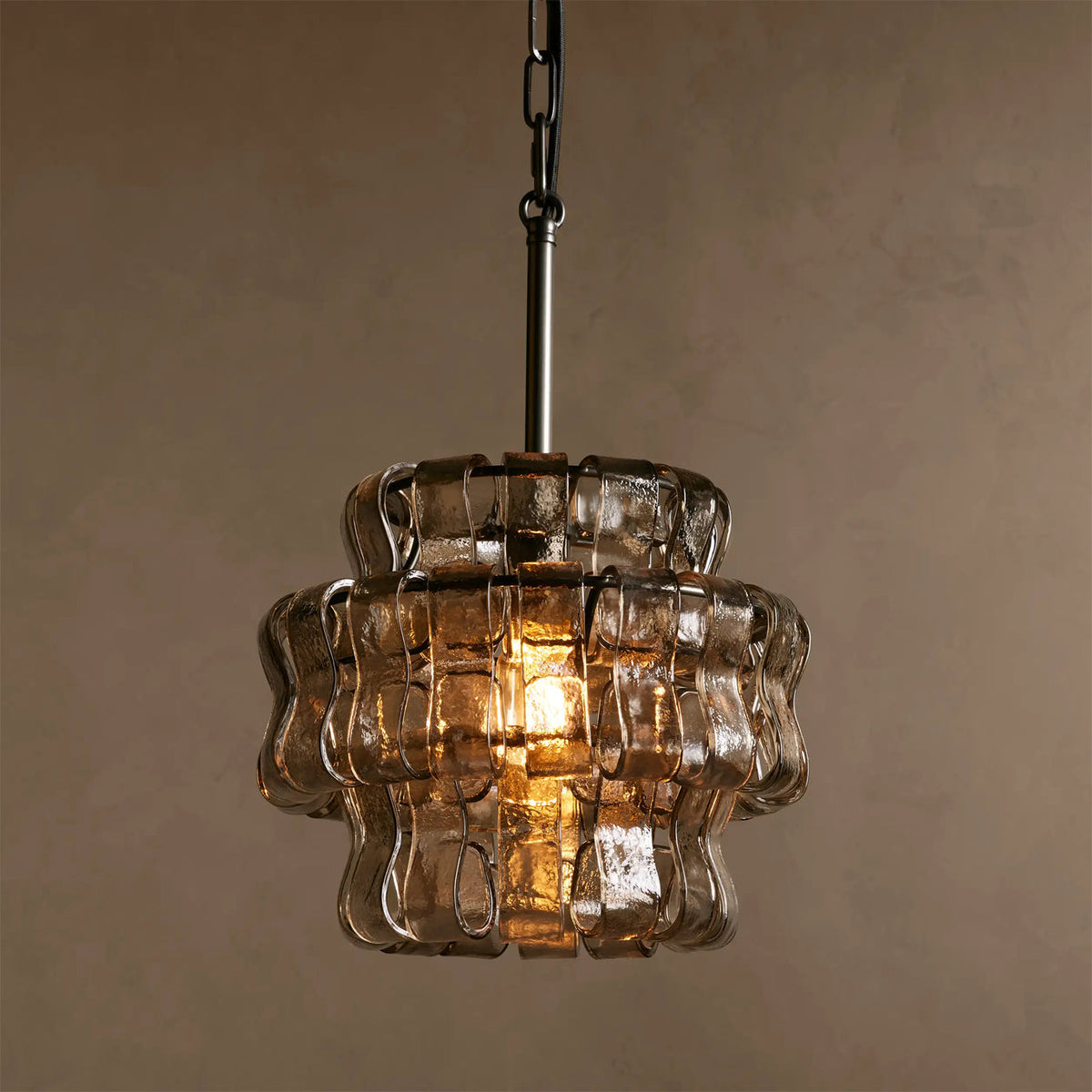Detail shot of the gold metal fixture and ceiling mount for the Nirsa Pendant Light.
