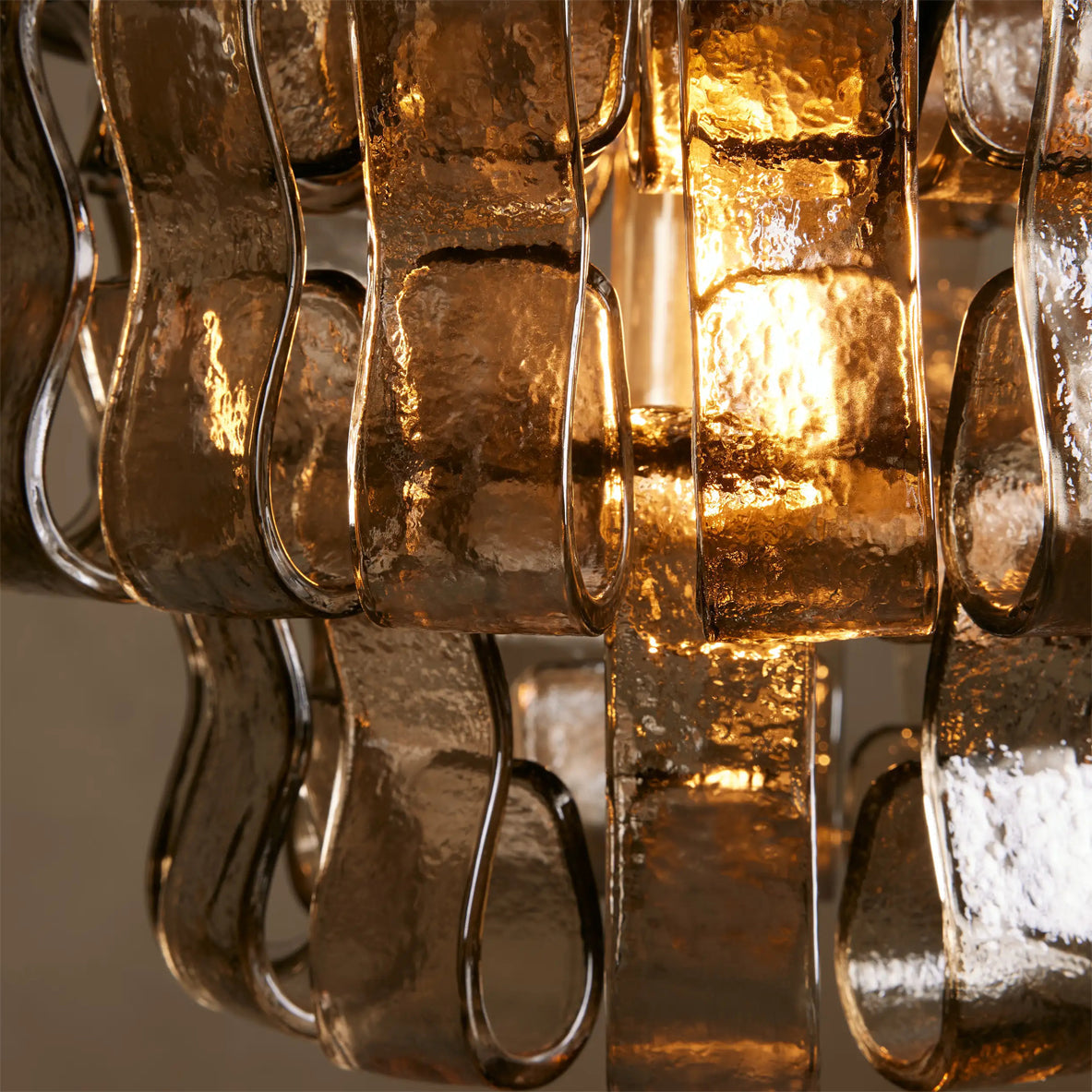 The Green version of the Nirsa Pendant Light hanging in a contemporary kitchen.