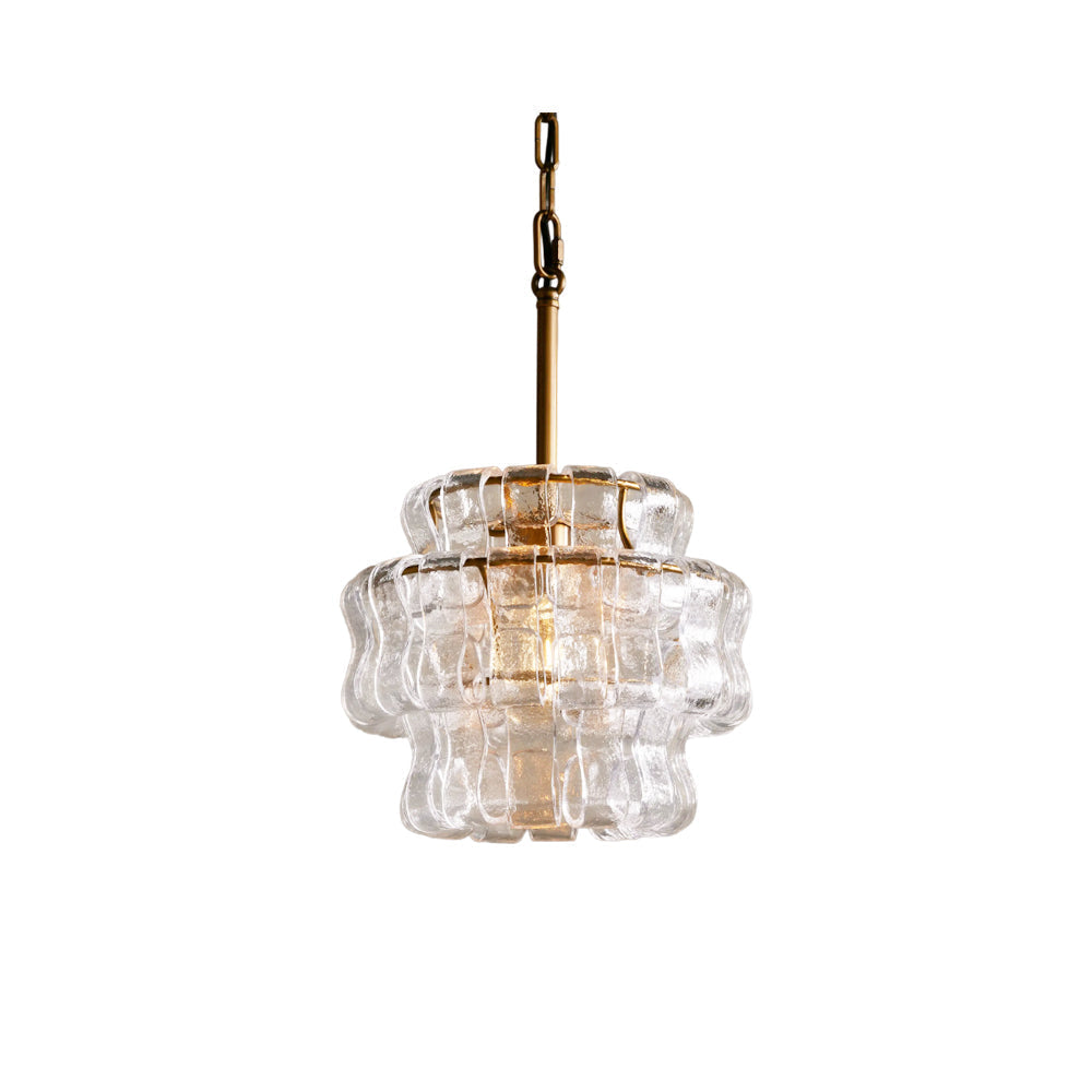 Nirsa Pendant Light with clear and gold glass, illuminated.