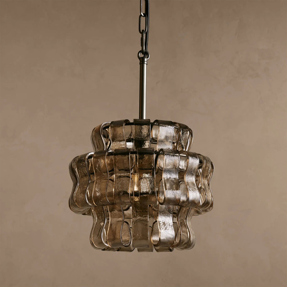 Nirsa Pendant Light in Black, hanging in a modern living room.