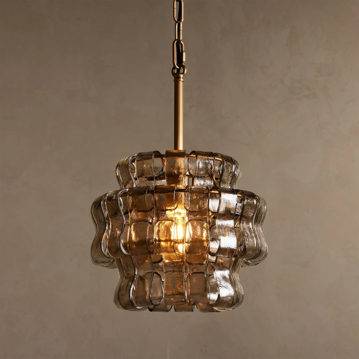 Nirsa Pendant Light in Green, showcasing the color when lit.