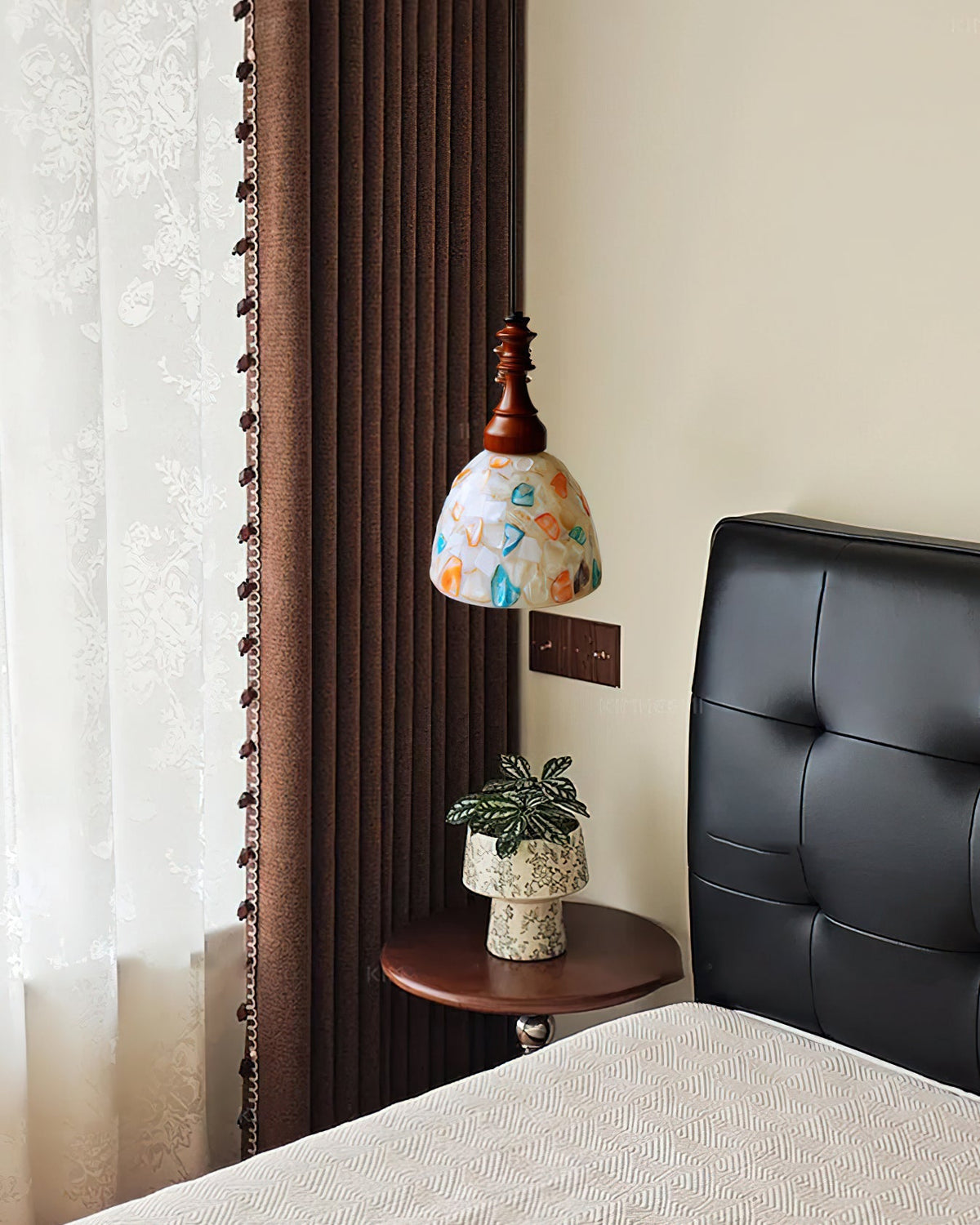 Lifestyle image of the Nonna Pendant Light in a dining room setting.