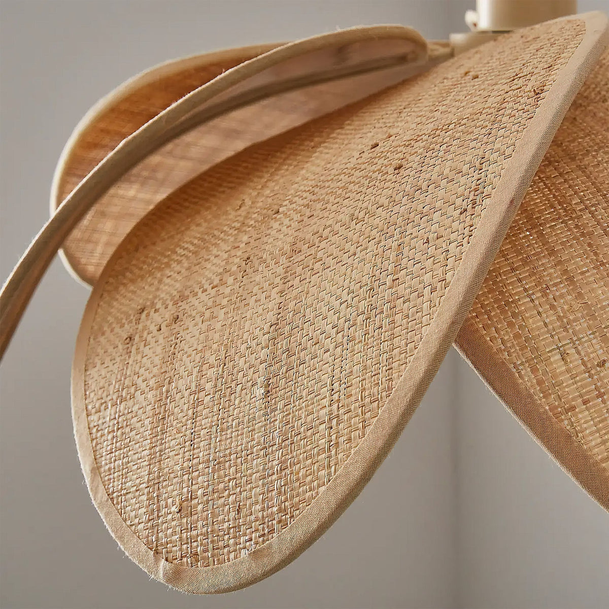 Odilia Pendant Light hanging over a wooden dining table.