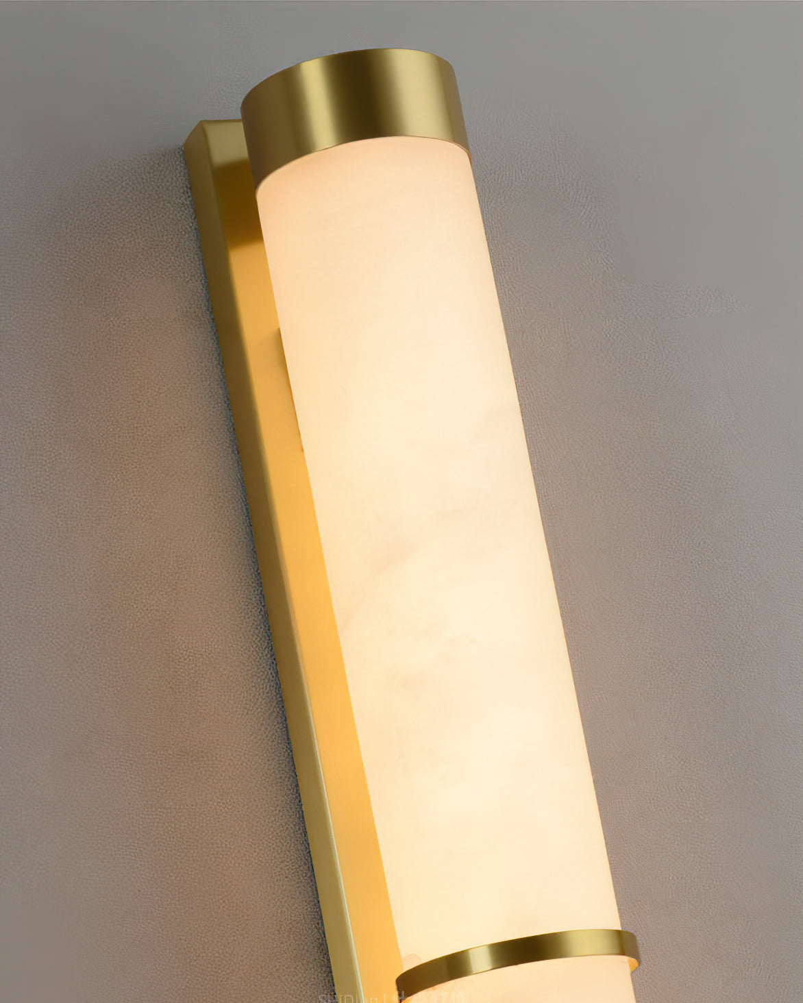 The Olmirira Alabaster Wall Light shown in its white finish.