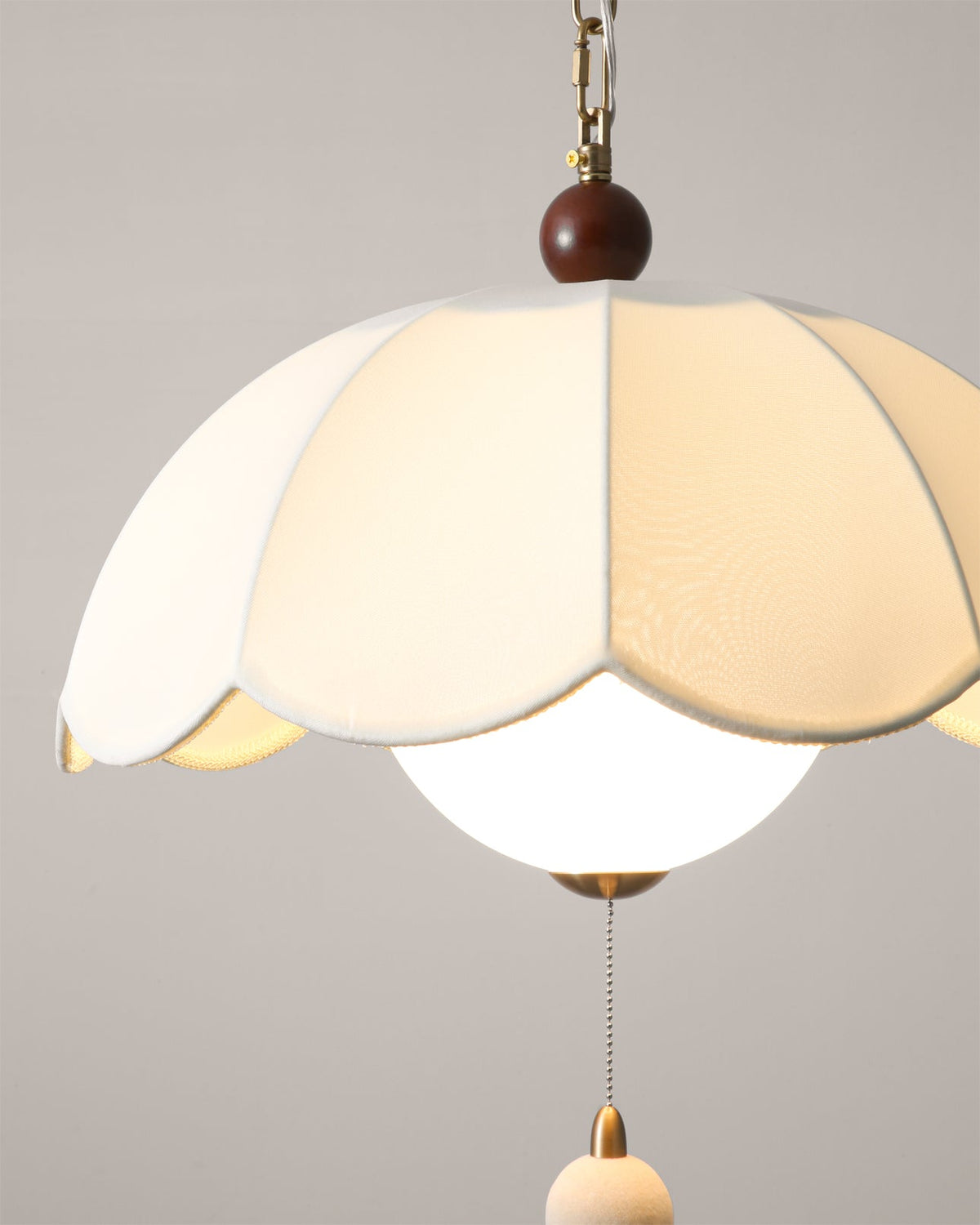 The smaller size (17.7") Oriente Pendant Light shown to scale.