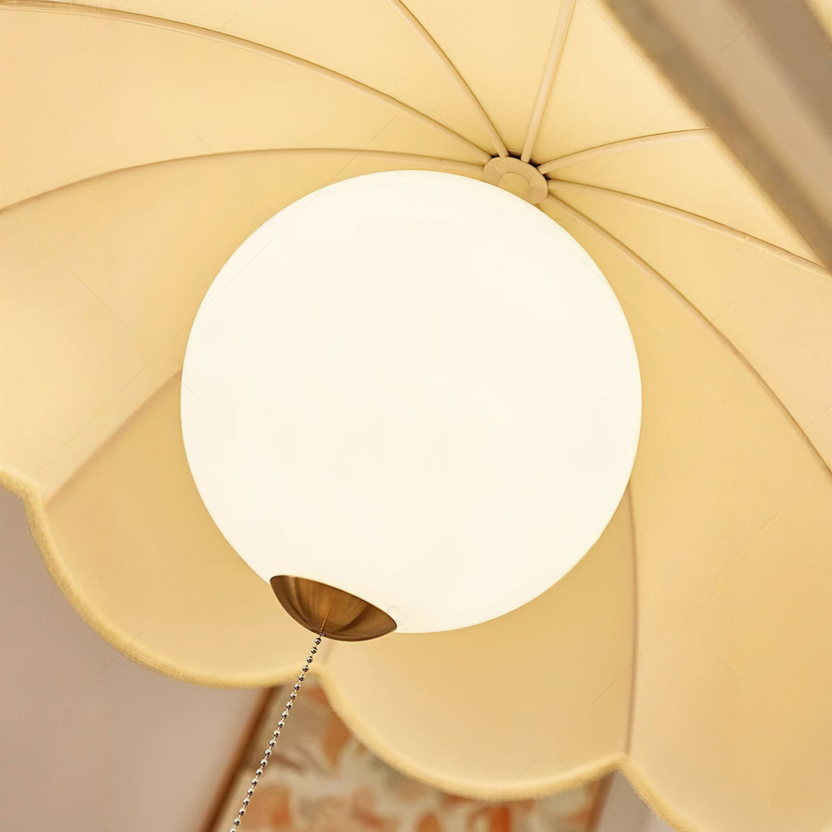 View from below the Oriente Pendant Light, showing the bulb fixture.