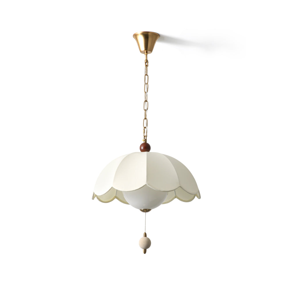 Oriente Pendant Light with a scalloped white fabric shade.