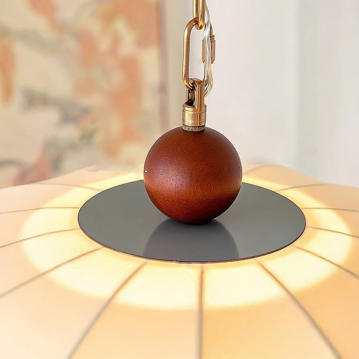 The wooden and metal accents on the top of the pendant light.