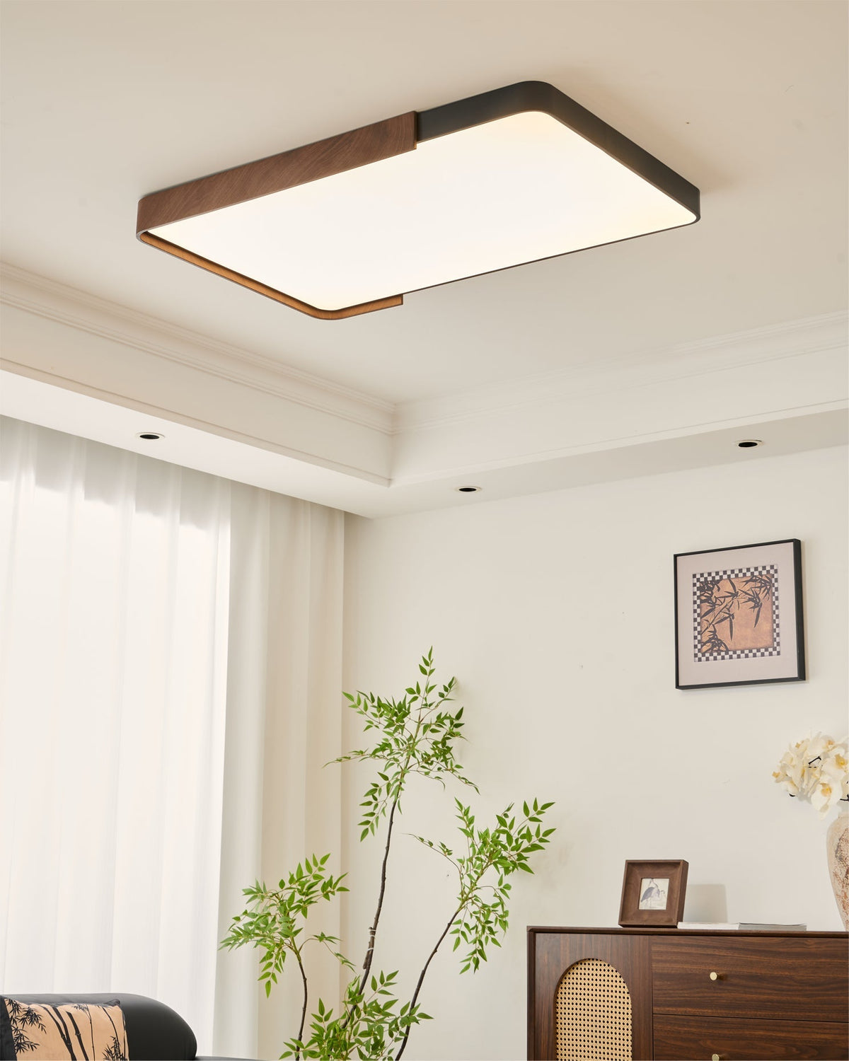 The Orren Ceiling Light illuminating a contemporary dining area.