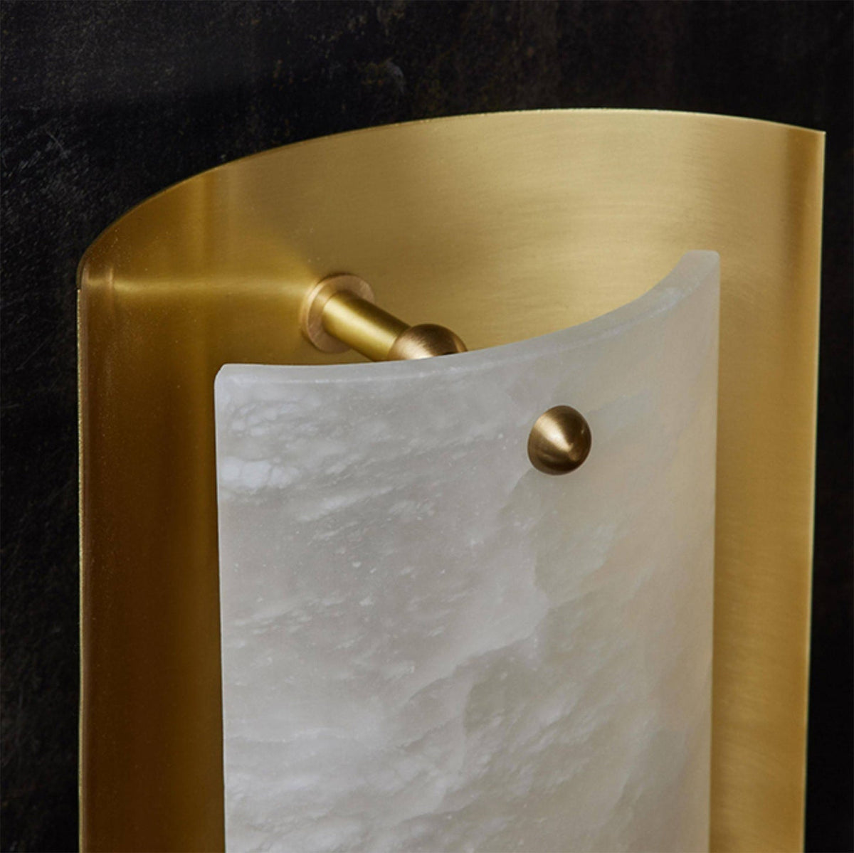 The Osman Wall Lamp shown in a contemporary living room setting.