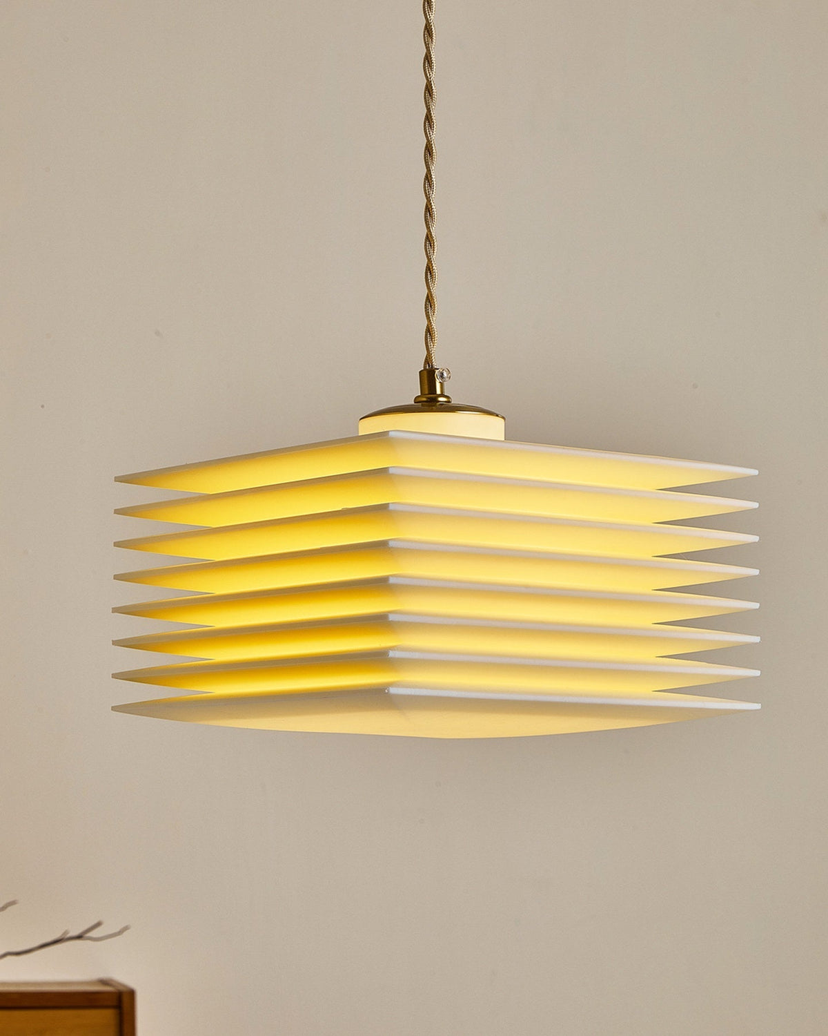 Pagoda Pendant Lamp used as a centerpiece over a table.