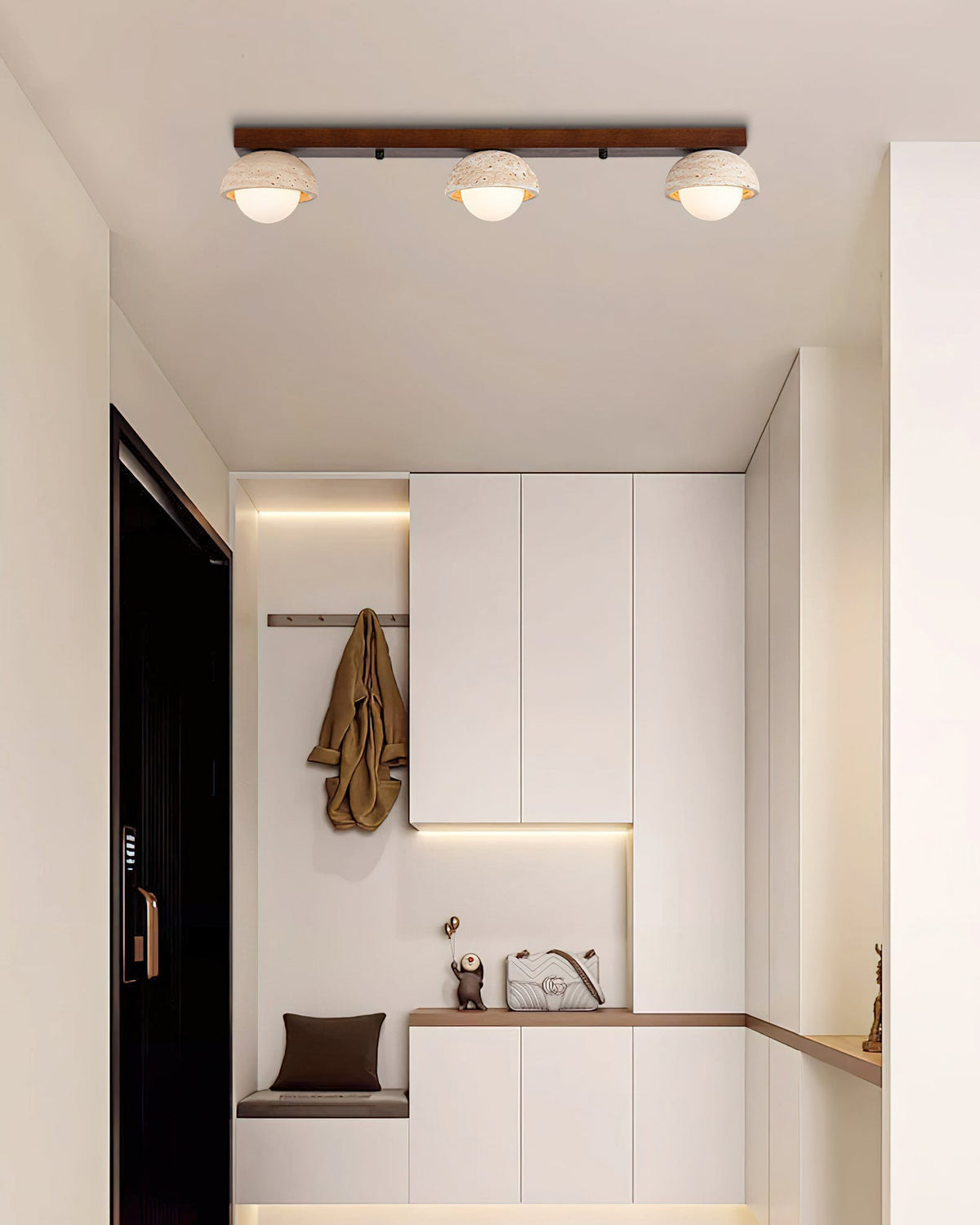 Detail shot of the natural texture of the travertine stone shade.