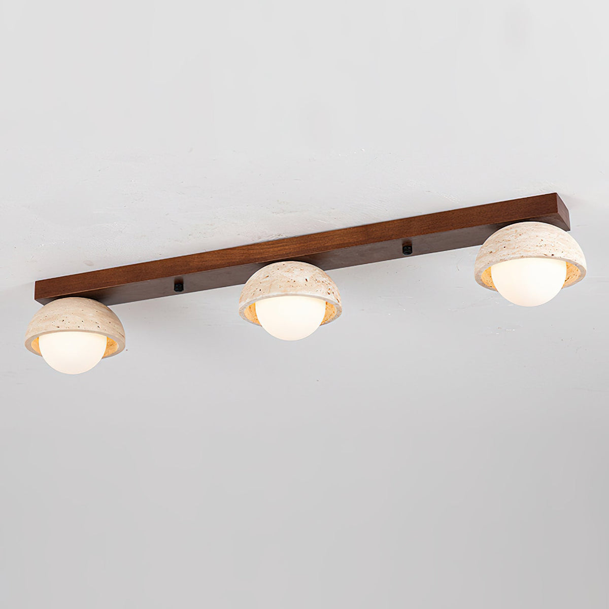 The Palermo ceiling light illuminating a room with a warm glow.