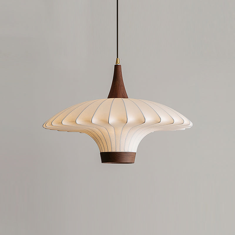 Lifestyle image featuring the Parasol Pendant Light in a contemporary living area.