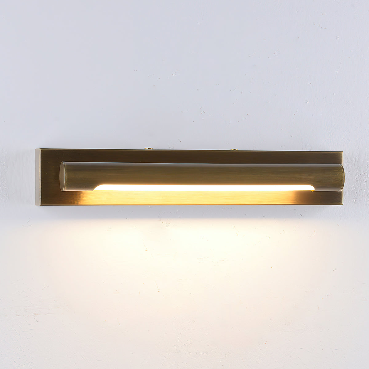 Side profile of the Penrith Linear Wall Sconce in a classic brass finish.