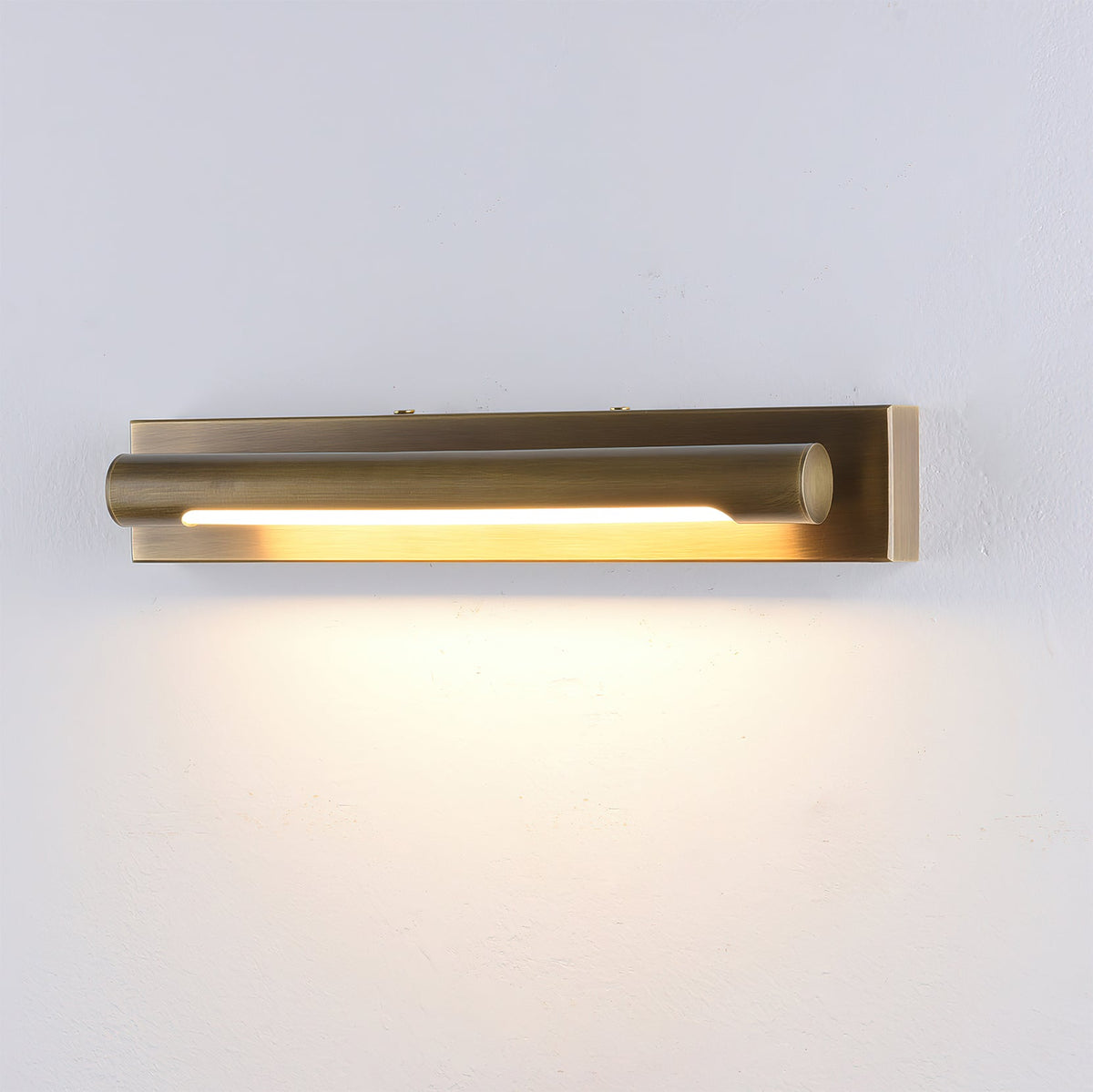 Close-up of the Penrith Linear Wall Sconce's brass material and texture.