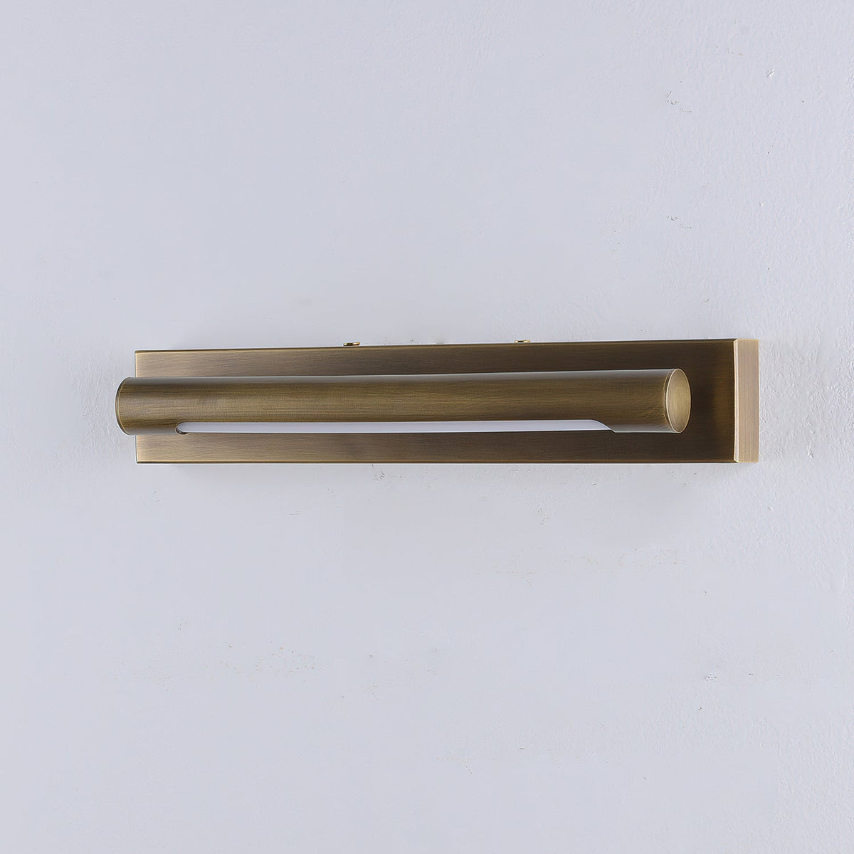 Angled view of the Penrith Linear Wall Sconce in a sleek black finish.