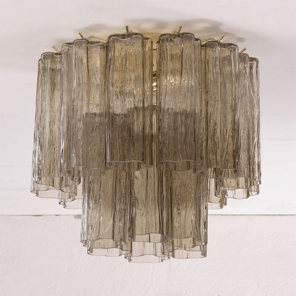 Peony ceiling mount in amber glass, unlit.