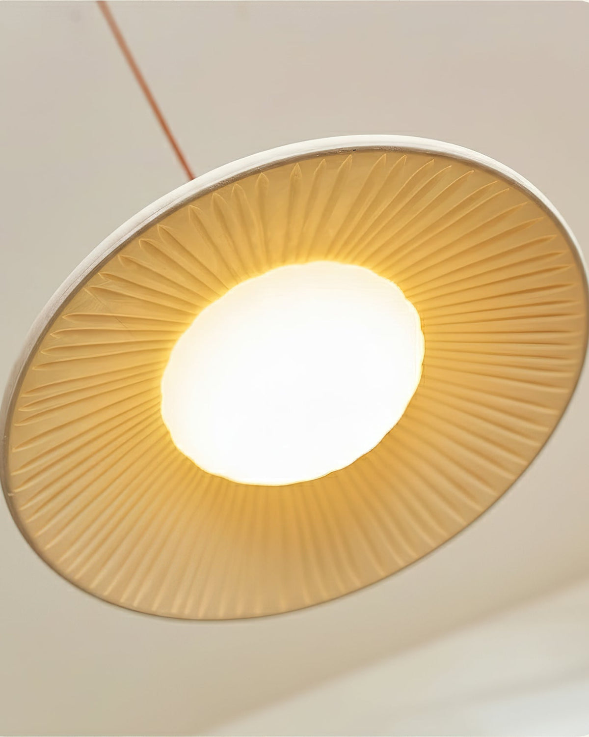 View from below of the integrated LED light source of the Piero Pendant Lamp.