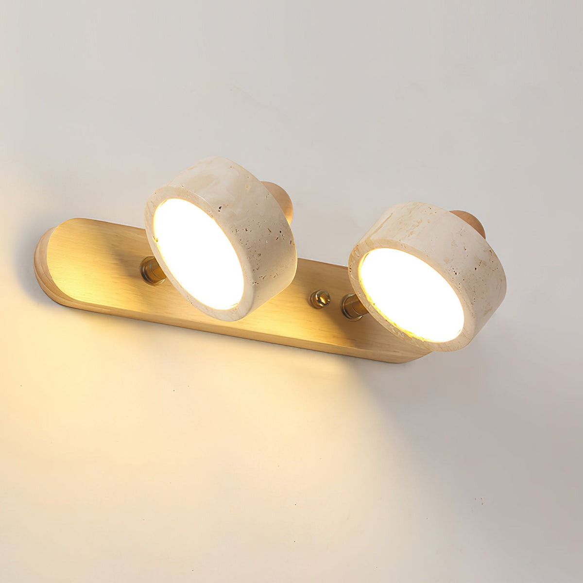 Front view of the 3-head Piero Travertine Wall Lamp.