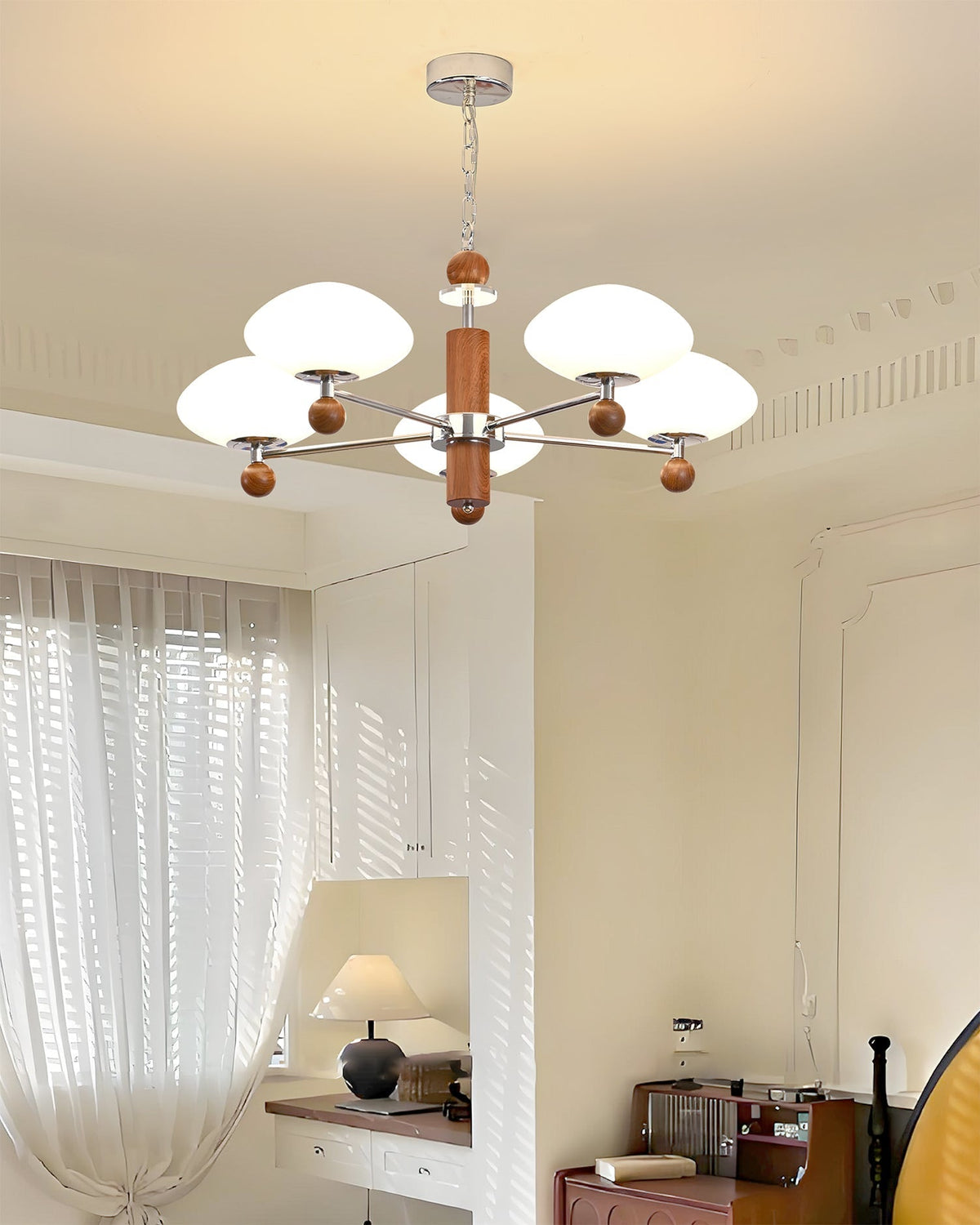 Pointed Chandelier illuminated, casting a warm glow.