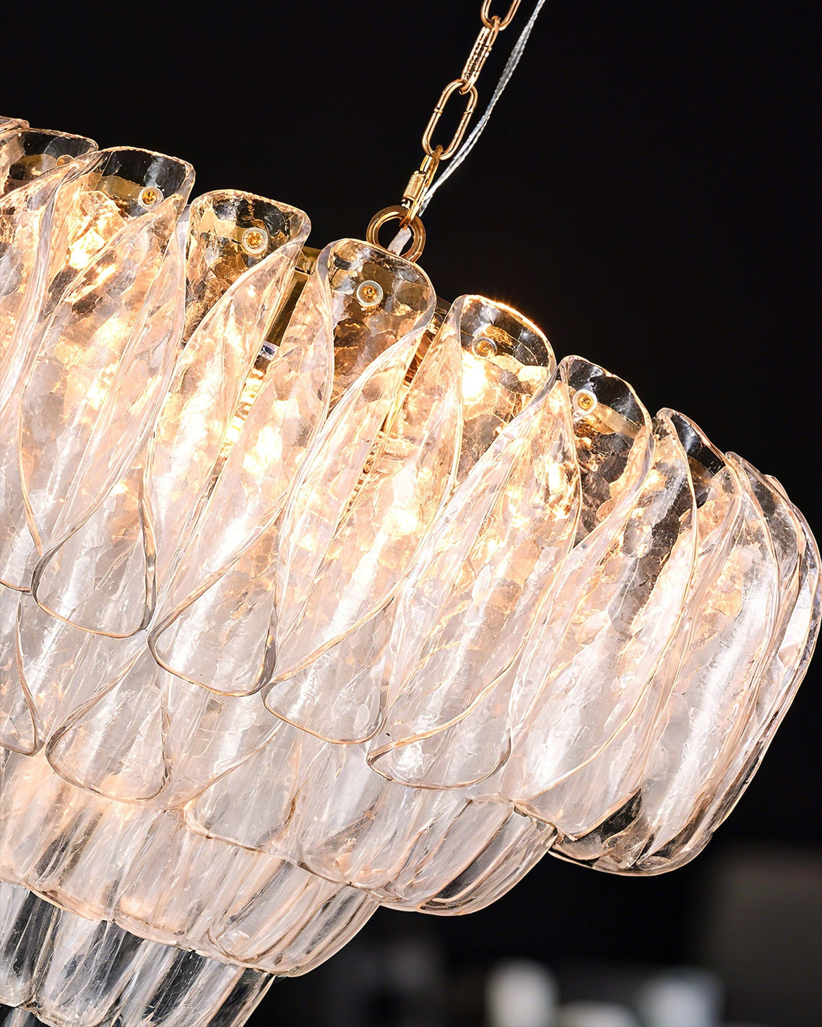 The chandelier shown from below, highlighting the pattern of light diffusion.