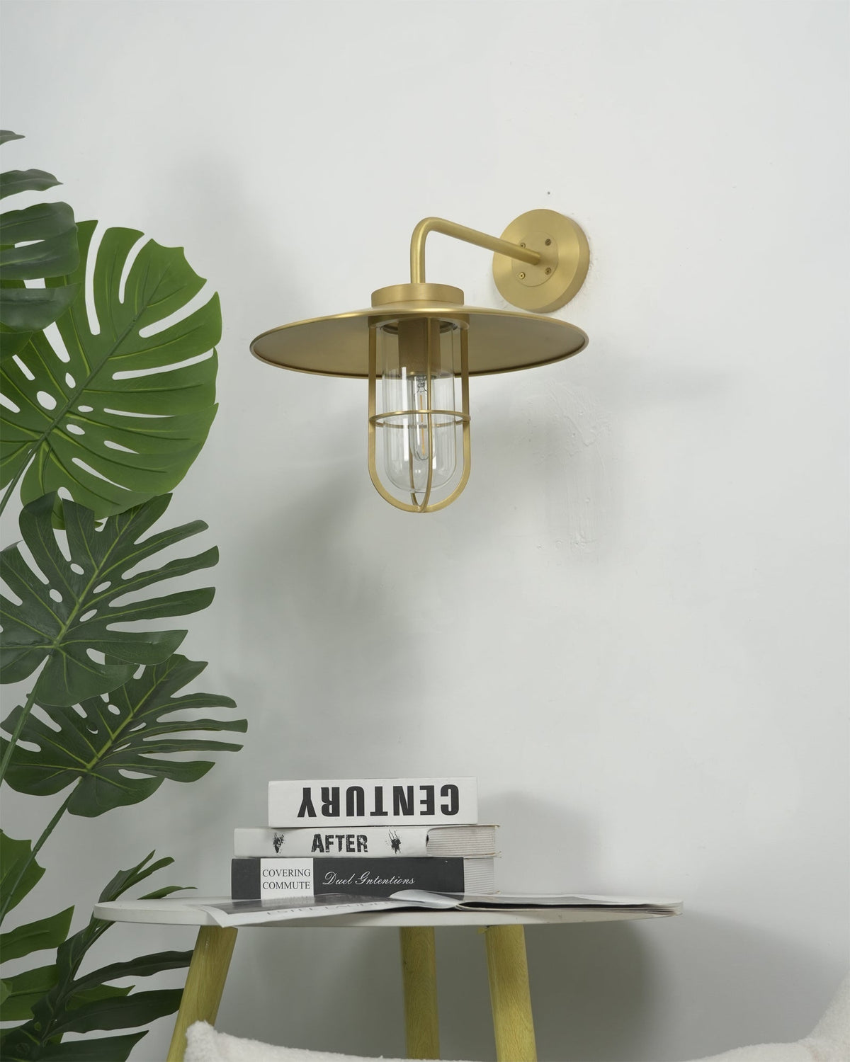 Lifestyle image of the Portree Wall Light in a hallway setting.
