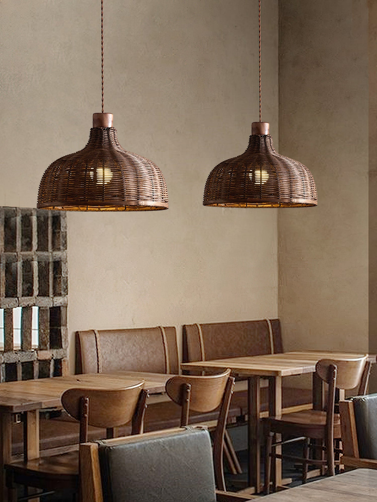 Rasa Pendant Light hanging over a wooden dining table.
