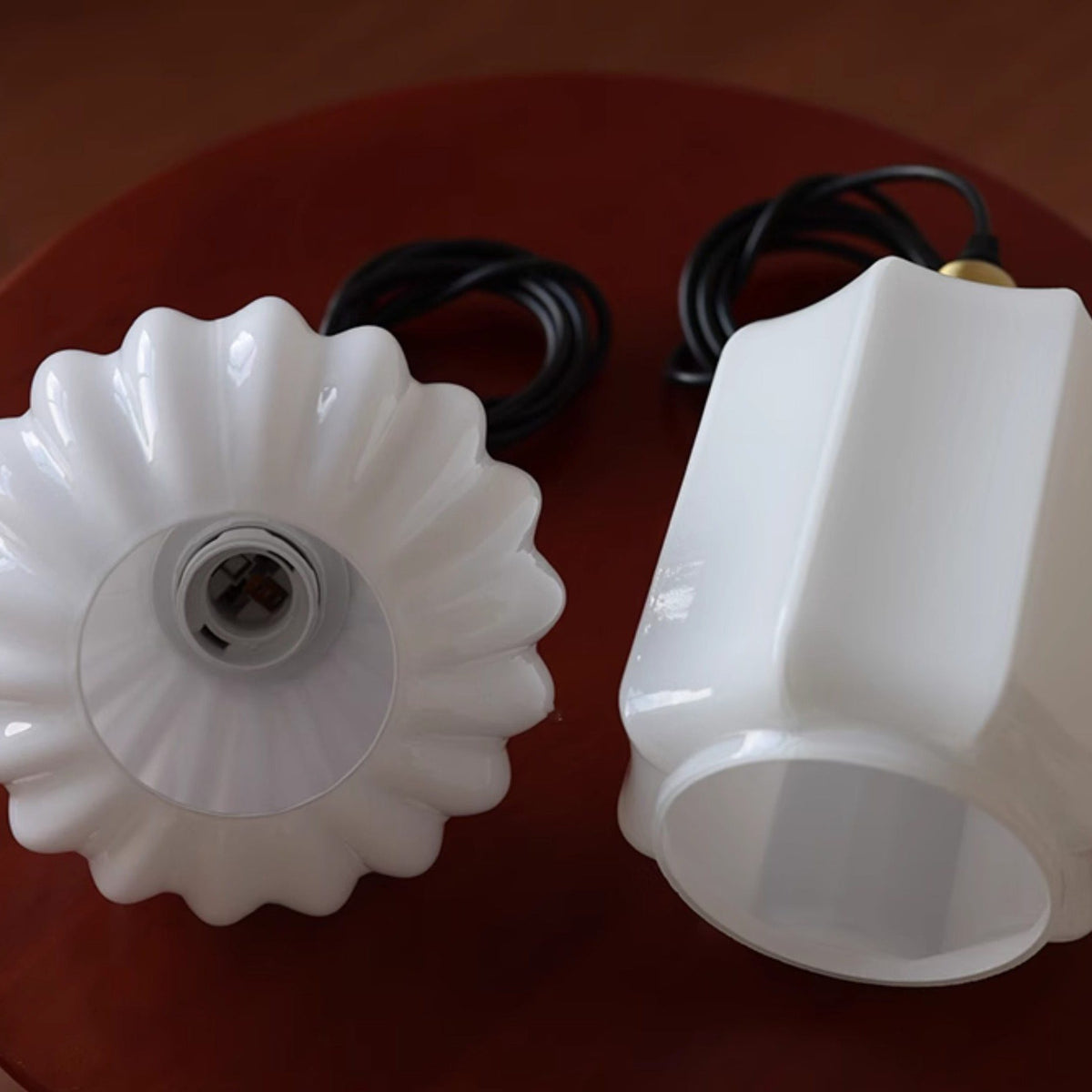 Size comparison between Model A and Model B of the Rayburn Pendant Light.