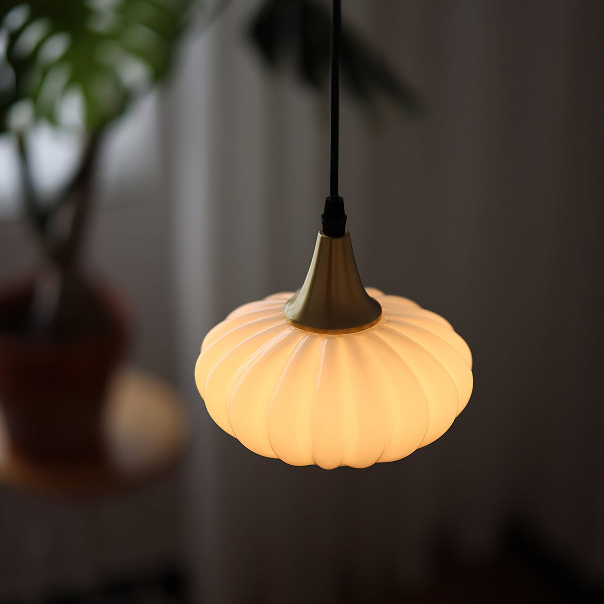 A pair of Rayburn Pendant Lights hanging over a kitchen island.