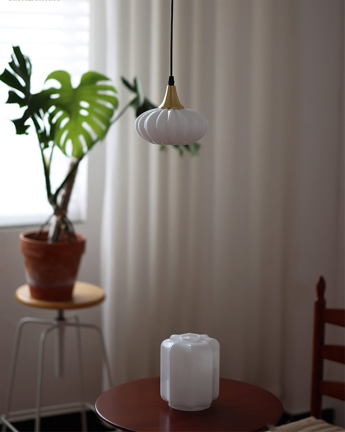 Model B of the Rayburn Pendant Light against a neutral background.