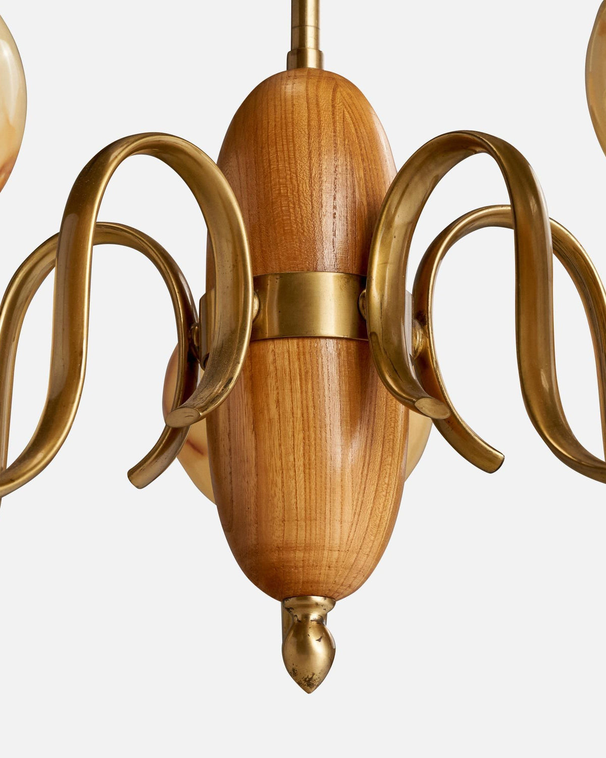 The chandelier shown with vintage-style Edison filament bulbs.