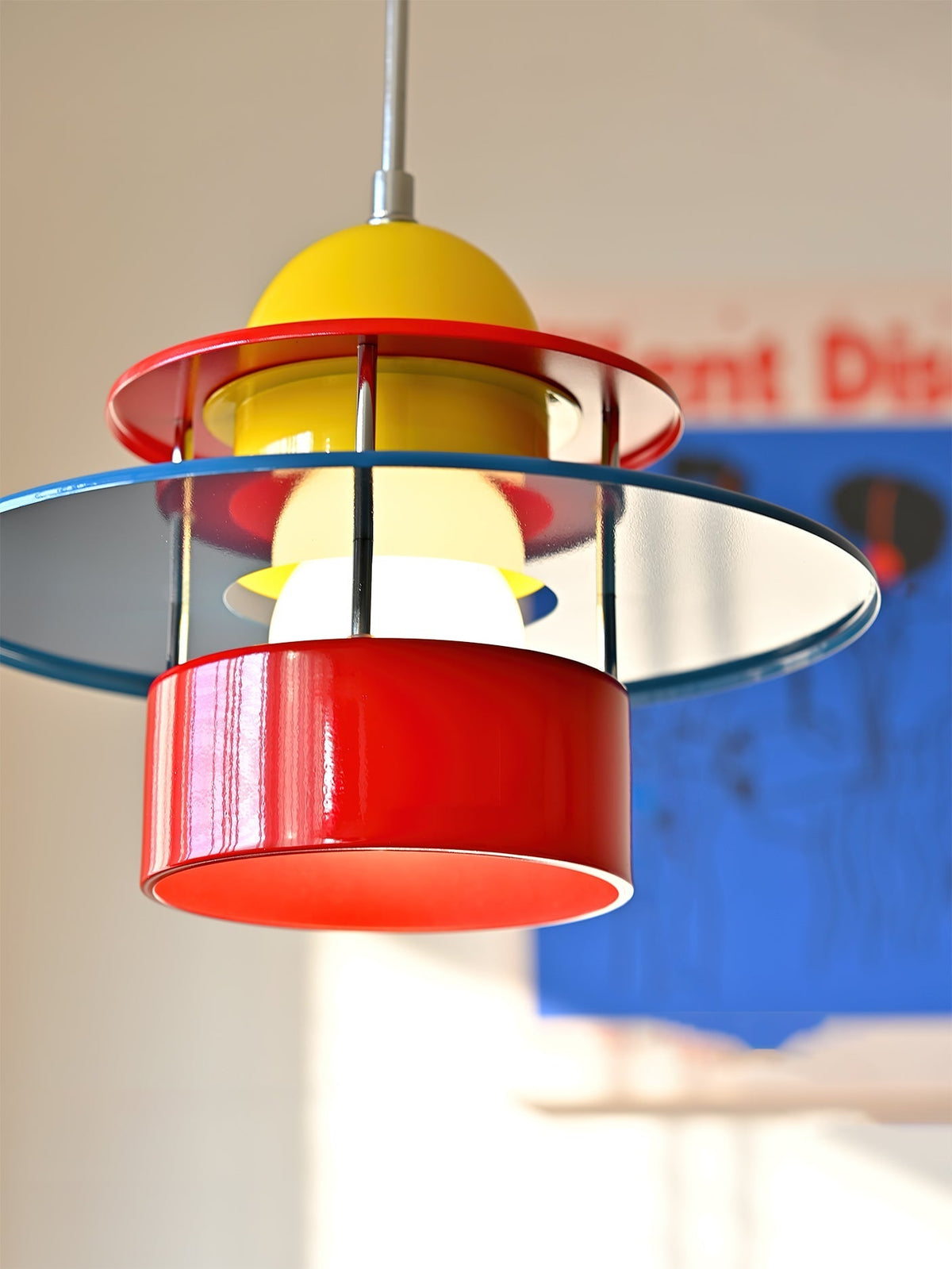 Rolly Pendant Light against a plain background to show its vibrant colors.