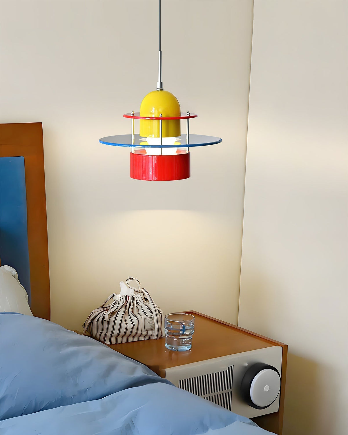Angled view of the multicolor Memphis-style pendant light.