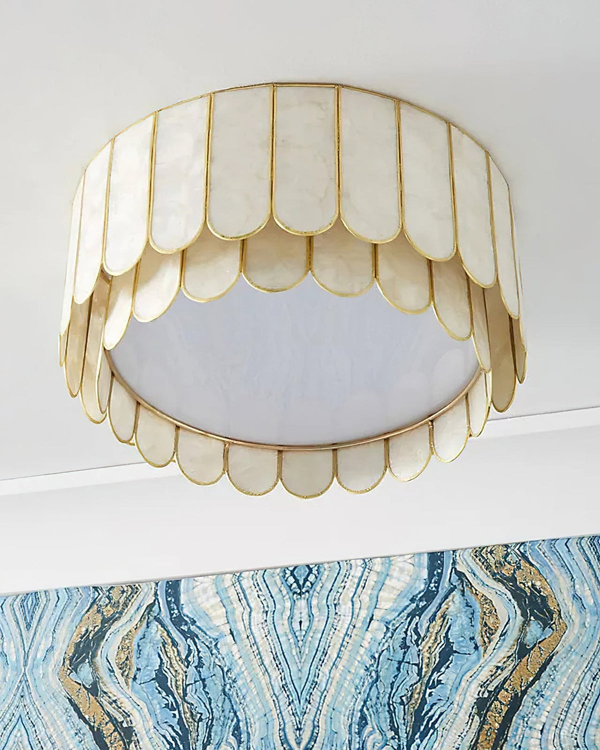 Rosa Capiz Ceiling Lamp lit up, casting a warm glow.