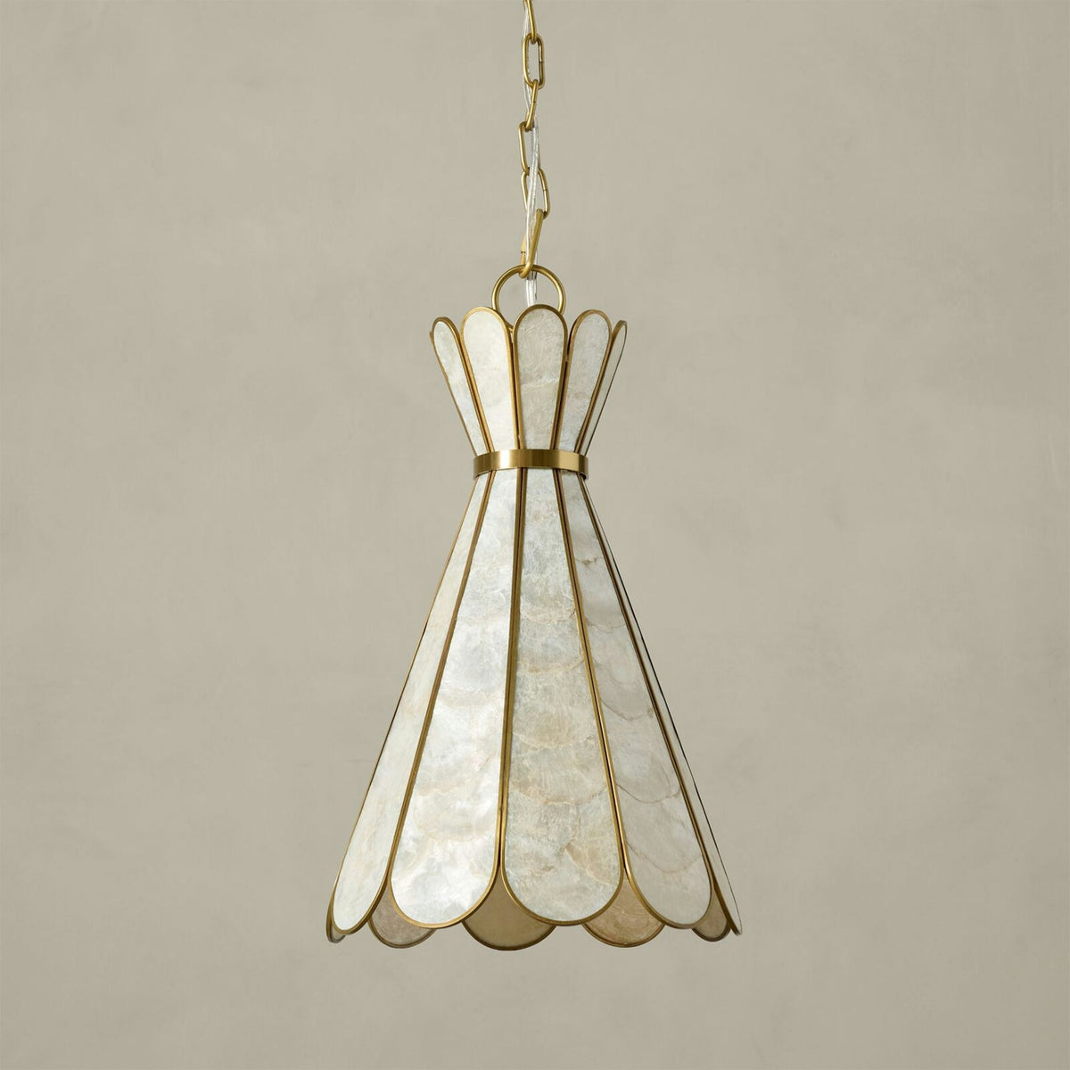 Rosalind Capiz Petal Pendant Lamp shown from a low angle.