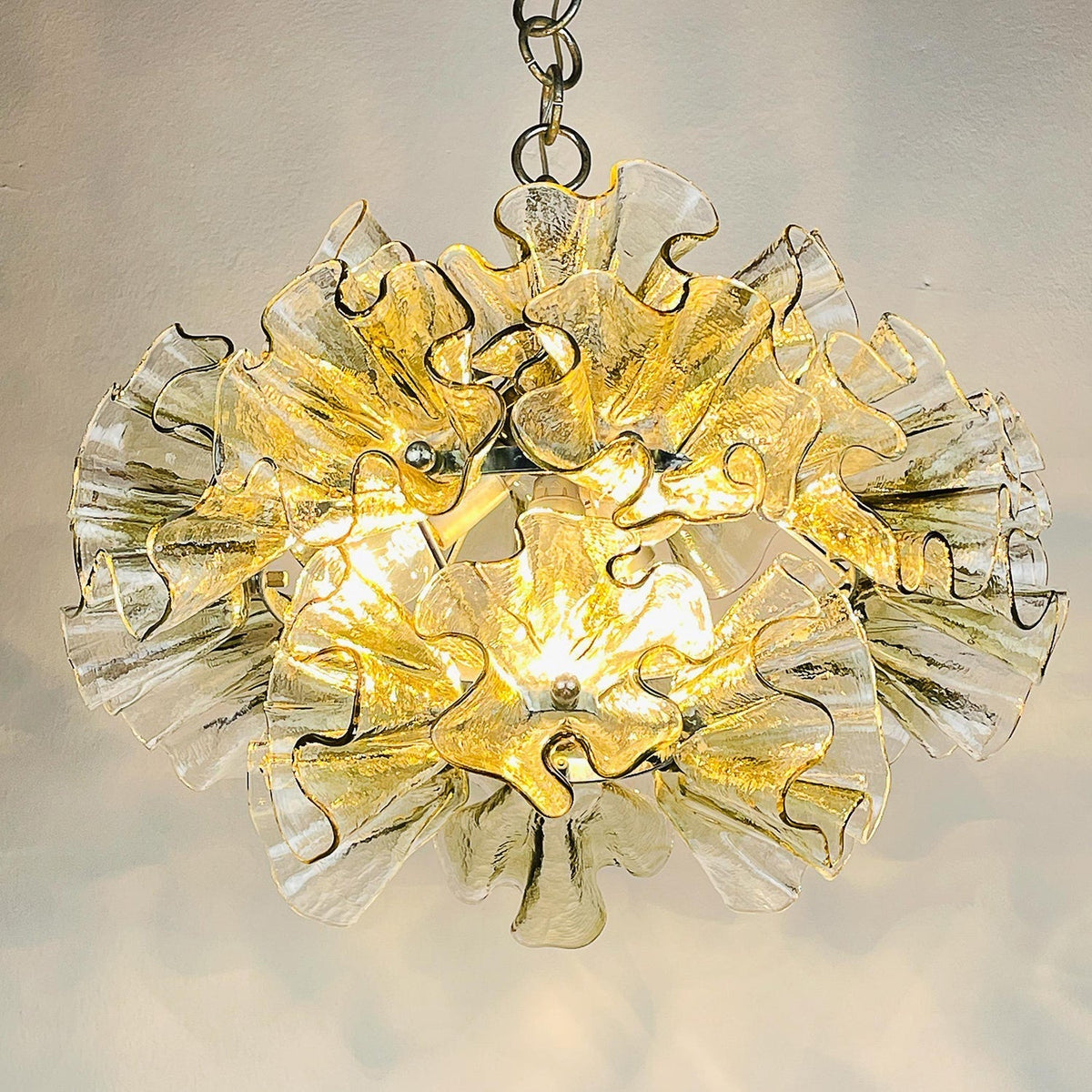 Detail shot of the clear glass petals on the chandelier.