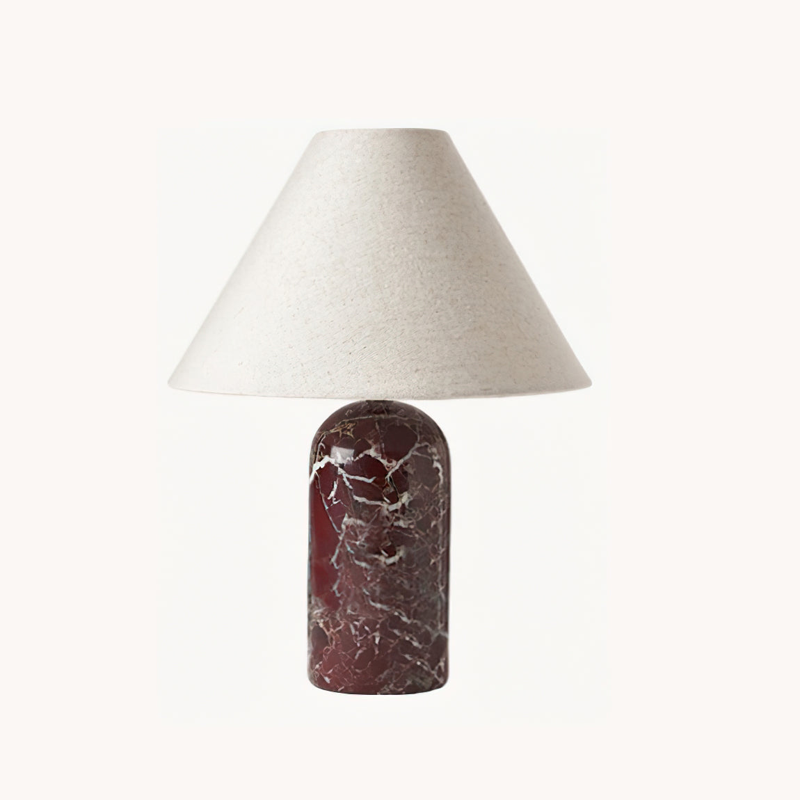 The lamp styled on an entryway console table, creating a welcoming atmosphere.